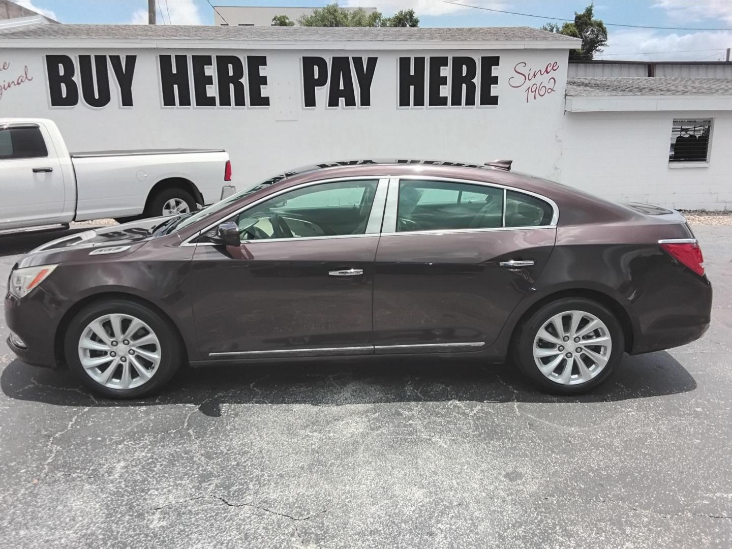 2016 RED /Beige Buick LaCrosse Base (1G4GA5G39GF) with an 3.6L V6 DOHC 24V FFV engine, 6A transmission, located at 6112 N Florida Avenue, Tampa, FL, 33604, (888) 521-5131, 27.954929, -82.459534 - $499 down plus tax.- Photo#0
