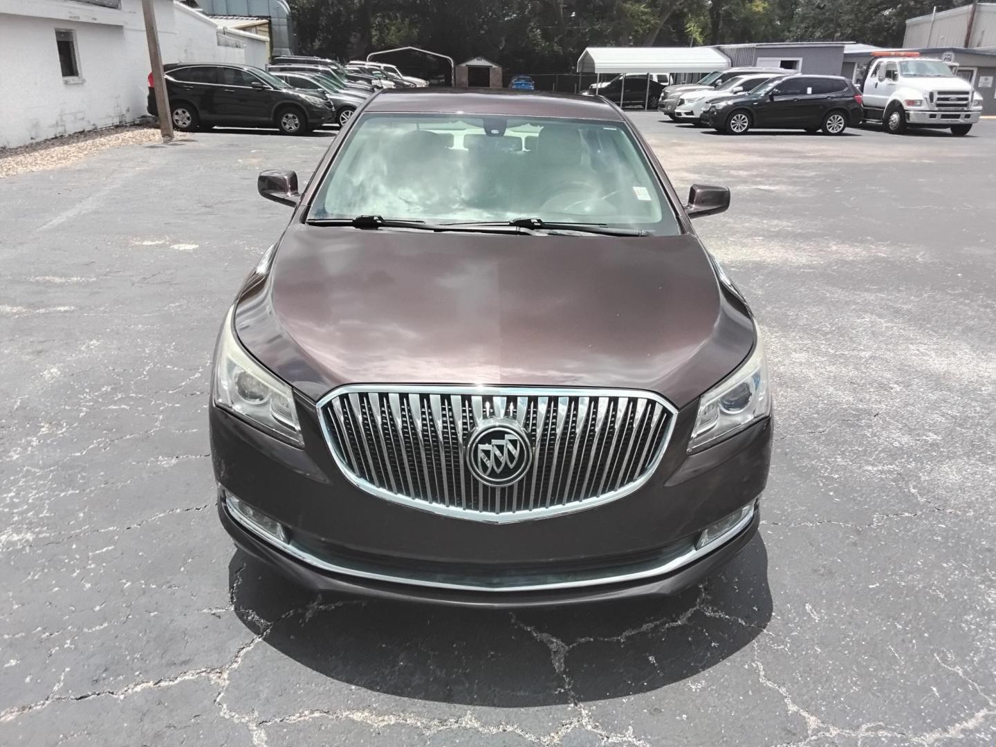 2016 RED /Beige Buick LaCrosse Base (1G4GA5G39GF) with an 3.6L V6 DOHC 24V FFV engine, 6A transmission, located at 6112 N Florida Avenue, Tampa, FL, 33604, (888) 521-5131, 27.954929, -82.459534 - $499 down plus tax.- Photo#1