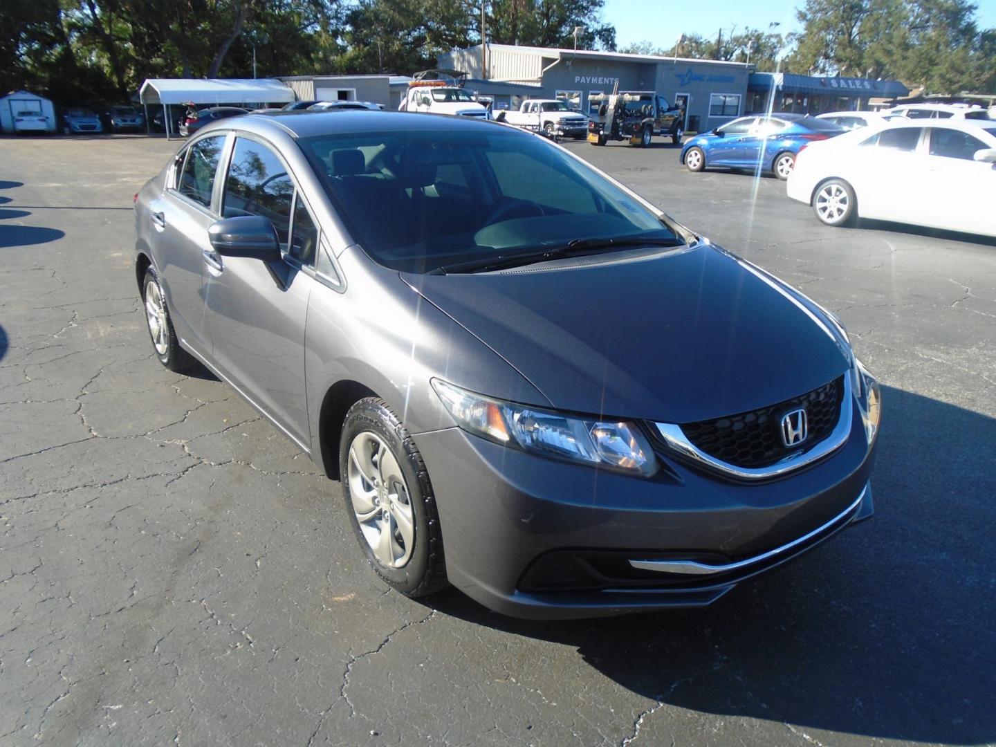 2014 Honda Civic LX Sedan CVT (19XFB2F56EE) with an 1.8L L4 SOHC 16V engine, Continuously Variable Transmission transmission, located at 6112 N Florida Avenue, Tampa, FL, 33604, (888) 521-5131, 27.954929, -82.459534 - Photo#2