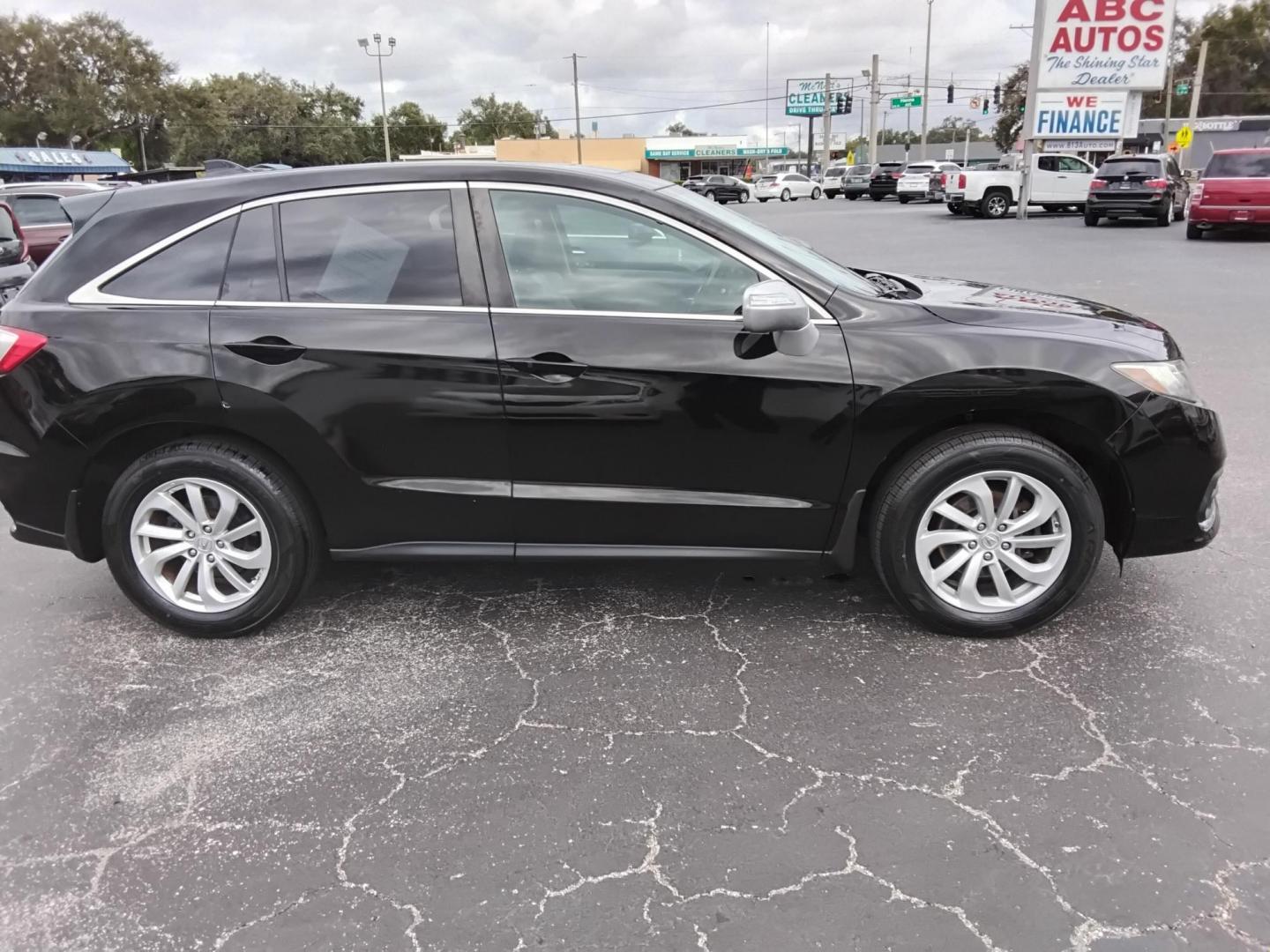 2016 BLACK /Black Acura RDX 6-Spd AT w/ Technology Package (5J8TB3H58GL) with an 2.3L L4 DOHC 16V engine, 6-Speed Automatic transmission, located at 6112 N Florida Avenue, Tampa, FL, 33604, (888) 521-5131, 27.954929, -82.459534 - 499$ down plus tax & tag. - Photo#3