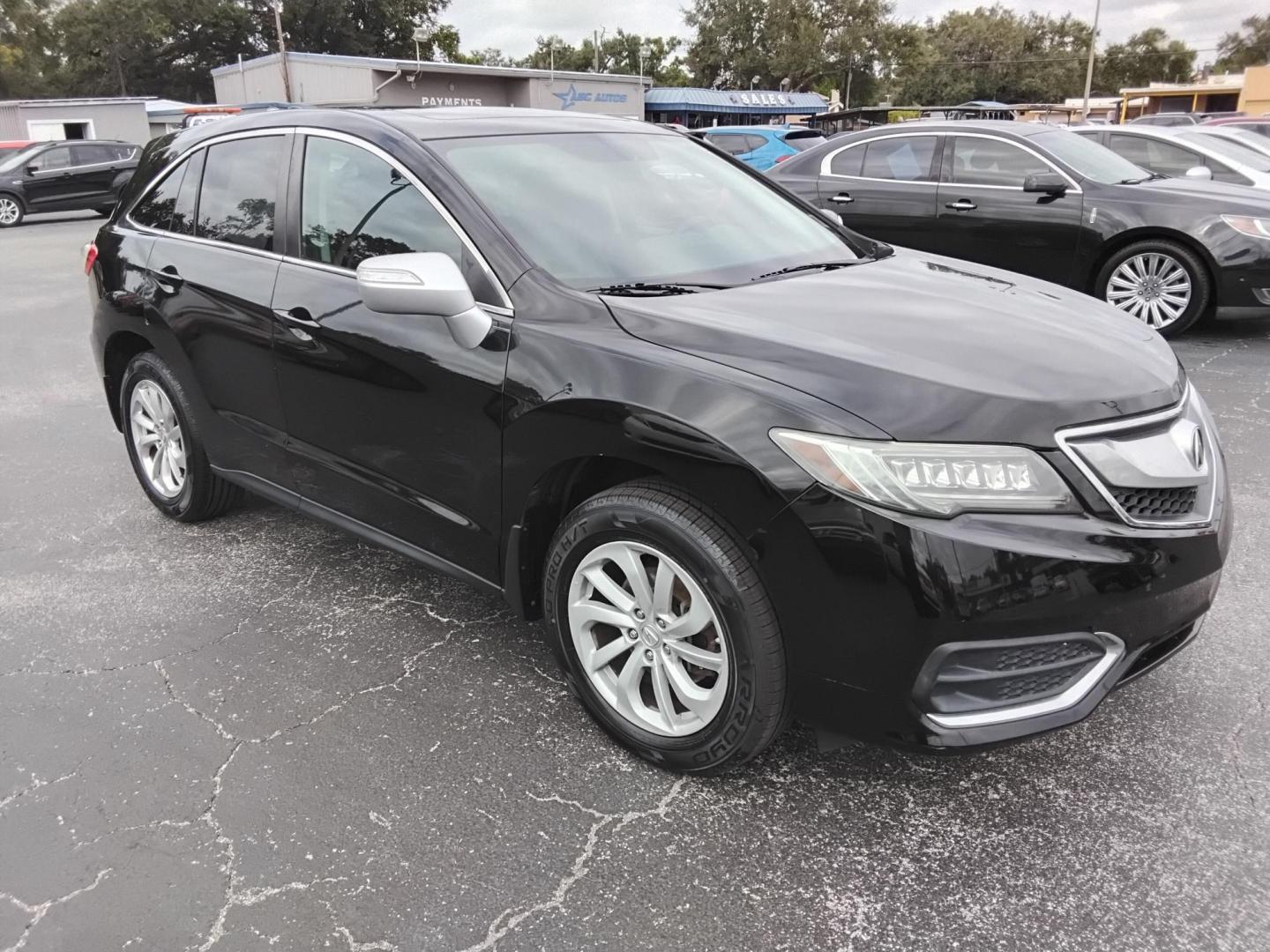2016 BLACK /Black Acura RDX 6-Spd AT w/ Technology Package (5J8TB3H58GL) with an 2.3L L4 DOHC 16V engine, 6-Speed Automatic transmission, located at 6112 N Florida Avenue, Tampa, FL, 33604, (888) 521-5131, 27.954929, -82.459534 - 499$ down plus tax & tag. - Photo#4