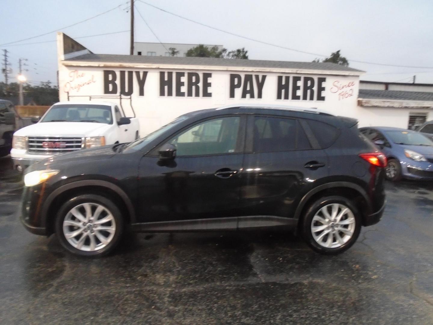 2014 Mazda CX-5 Grand Touring (JM3KE2DY0E0) with an 2.5L L4 DOHC 16V engine, 6-Speed Automatic transmission, located at 6112 N Florida Avenue, Tampa, FL, 33604, (888) 521-5131, 27.954929, -82.459534 - Photo#0