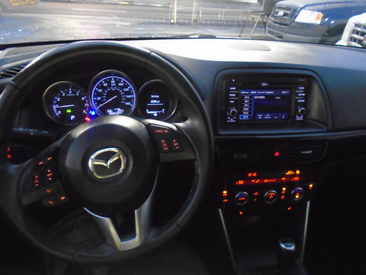 2014 Mazda CX-5 Grand Touring (JM3KE2DY0E0) with an 2.5L L4 DOHC 16V engine, 6-Speed Automatic transmission, located at 6112 N Florida Avenue, Tampa, FL, 33604, (888) 521-5131, 27.954929, -82.459534 - Photo#6