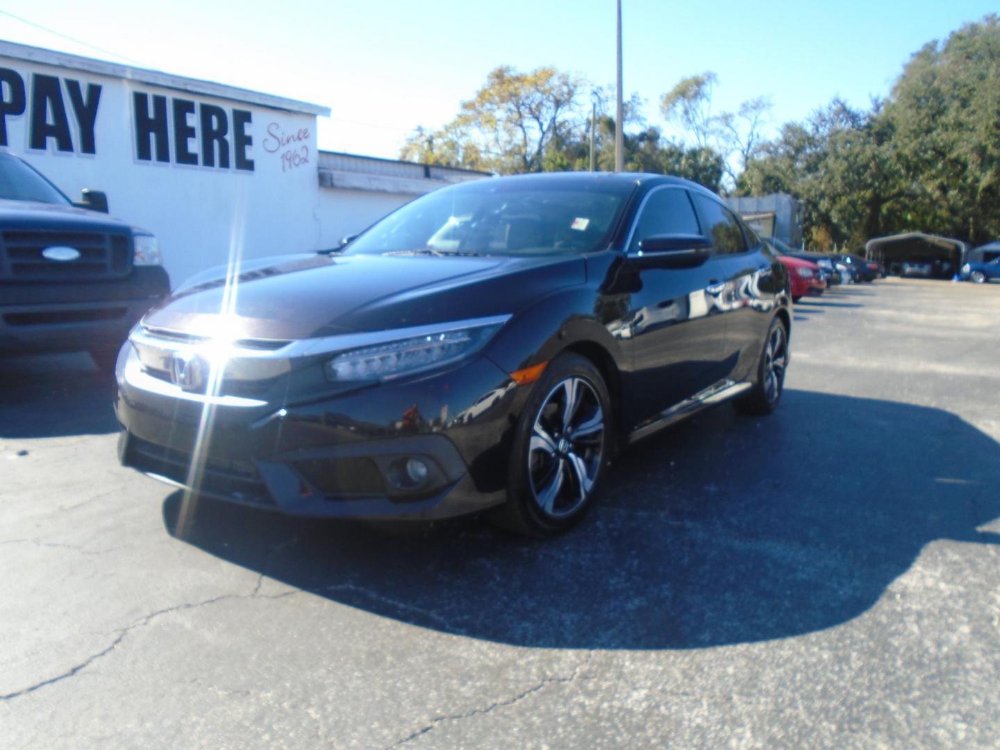 2016 Honda Civic Touring Sedan CVT (19XFC1F94GE) with an 1.5L L4 DOHC 16V TURBO engine, CVT transmission, located at 6112 N Florida Avenue, Tampa, FL, 33604, (888) 521-5131, 27.954929, -82.459534 - Photo#2