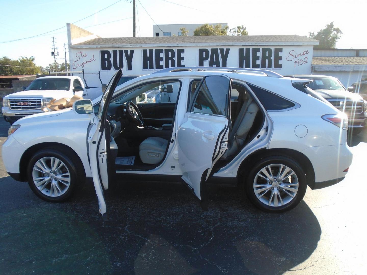 2011 Lexus RX 450h FWD (JTJZB1BA7B2) with an 3.5L V6 DOHC 24V HYBRID engine, 5-Speed Automatic transmission, located at 6112 N Florida Avenue, Tampa, FL, 33604, (888) 521-5131, 27.954929, -82.459534 - Photo#1