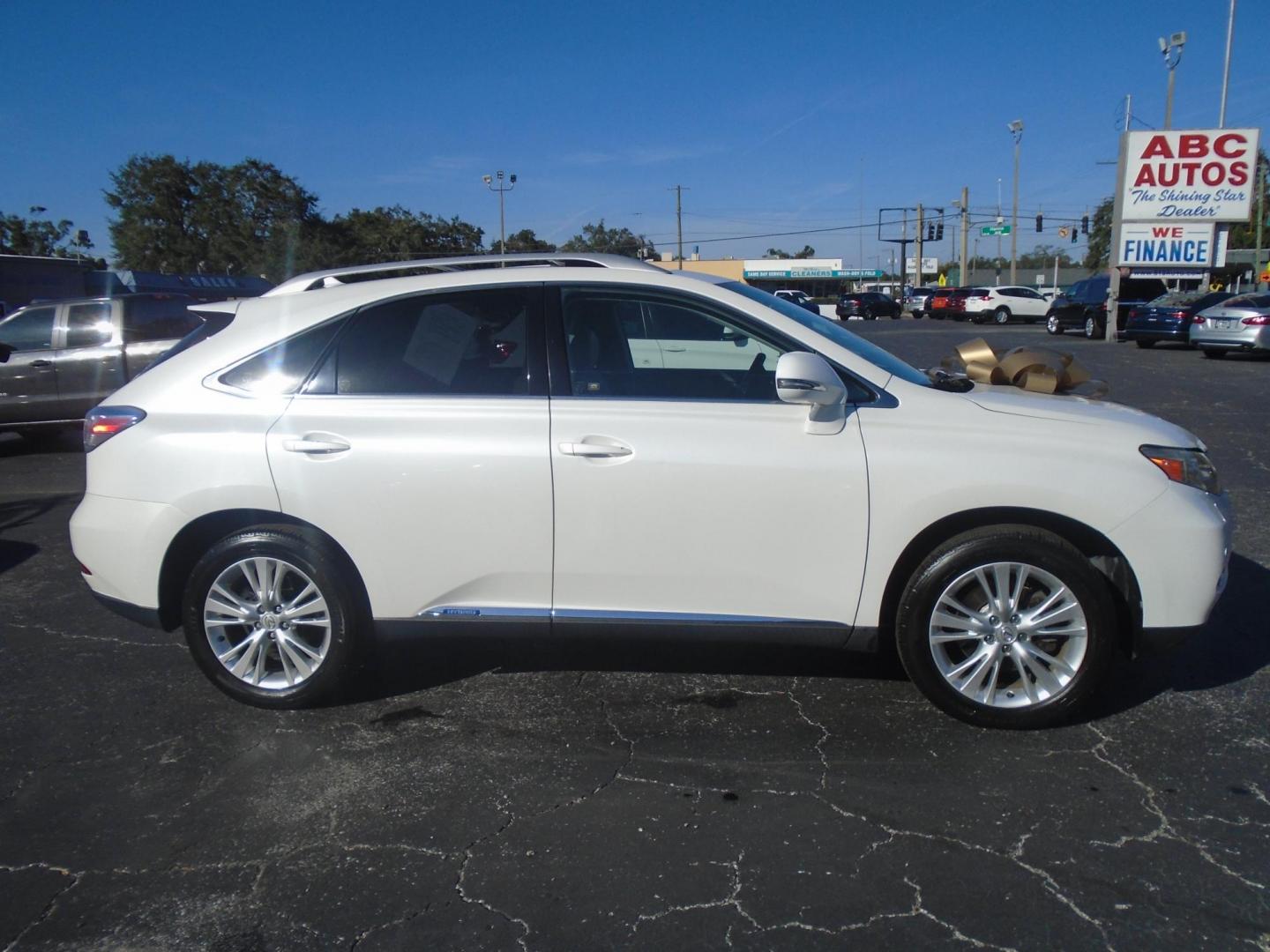 2011 Lexus RX 450h FWD (JTJZB1BA7B2) with an 3.5L V6 DOHC 24V HYBRID engine, 5-Speed Automatic transmission, located at 6112 N Florida Avenue, Tampa, FL, 33604, (888) 521-5131, 27.954929, -82.459534 - Photo#5