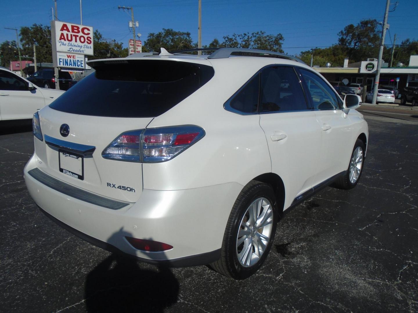 2011 Lexus RX 450h FWD (JTJZB1BA7B2) with an 3.5L V6 DOHC 24V HYBRID engine, 5-Speed Automatic transmission, located at 6112 N Florida Avenue, Tampa, FL, 33604, (888) 521-5131, 27.954929, -82.459534 - Photo#6