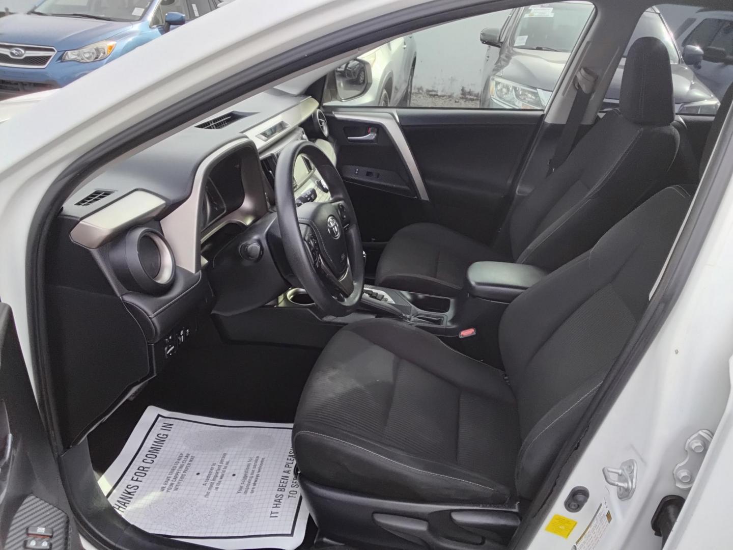 2014 White /Black Toyota RAV4 XLE FWD (JTMWFREV9EJ) with an 2.5L L4 DOHC 16V engine, 6-Speed Automatic transmission, located at 6112 N Florida Avenue, Tampa, FL, 33604, (888) 521-5131, 27.954929, -82.459534 - $499 down plus tax & tag. - Photo#11