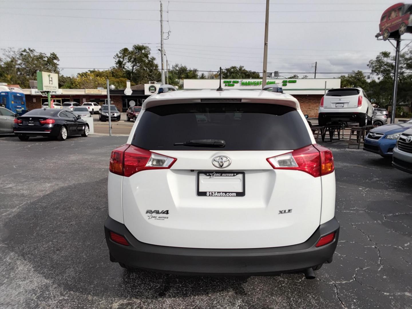 2014 White /Black Toyota RAV4 XLE FWD (JTMWFREV9EJ) with an 2.5L L4 DOHC 16V engine, 6-Speed Automatic transmission, located at 6112 N Florida Avenue, Tampa, FL, 33604, (888) 521-5131, 27.954929, -82.459534 - $499 down plus tax & tag. - Photo#7