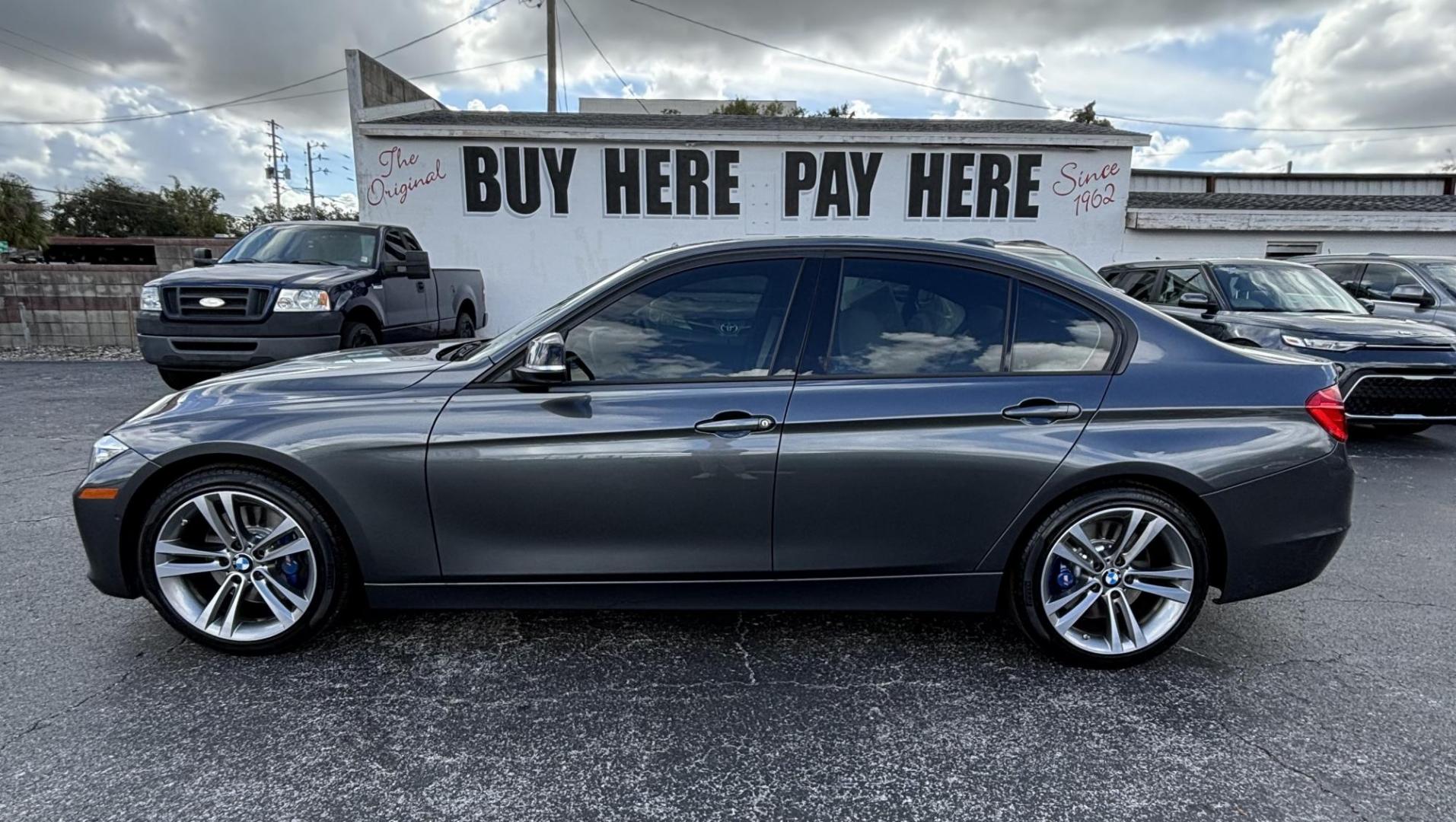 2015 BMW 3-Series 328i Sedan (WBA3A5C54FP) with an 2.0L L4 DOHC 16V engine, 8-Speed Automatic transmission, located at 6112 N Florida Avenue, Tampa, FL, 33604, (888) 521-5131, 27.954929, -82.459534 - Photo#0