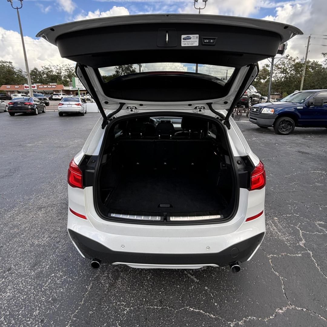 2017 BMW X1 sDrive28i (WBXHU7C37HP) with an 2.0L L4 DOHC 16V engine, 8A transmission, located at 6112 N Florida Avenue, Tampa, FL, 33604, (888) 521-5131, 27.954929, -82.459534 - Photo#4