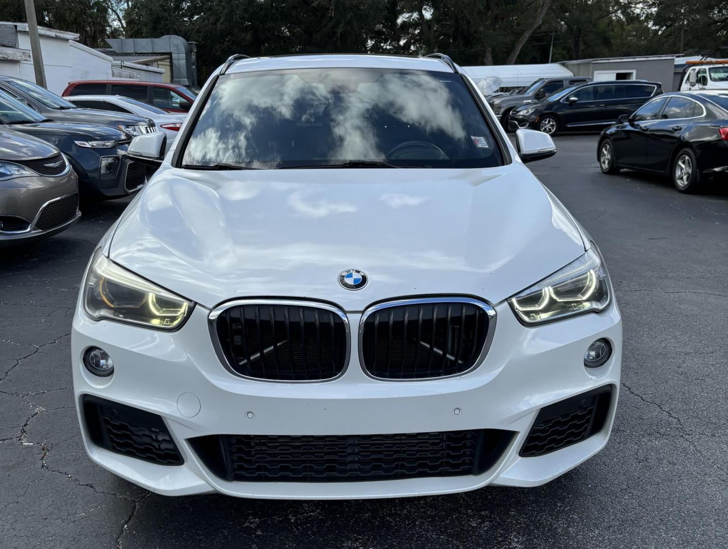 2017 BMW X1 sDrive28i (WBXHU7C37HP) with an 2.0L L4 DOHC 16V engine, 8A transmission, located at 6112 N Florida Avenue, Tampa, FL, 33604, (888) 521-5131, 27.954929, -82.459534 - Photo#2