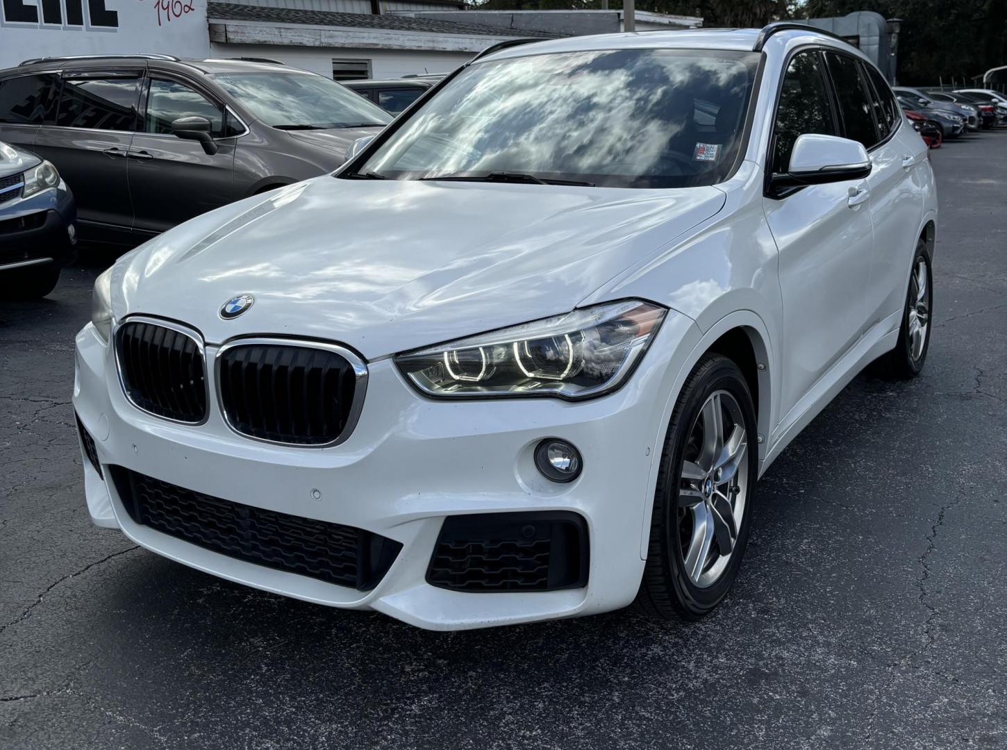 2017 BMW X1 sDrive28i (WBXHU7C37HP) with an 2.0L L4 DOHC 16V engine, 8A transmission, located at 6112 N Florida Avenue, Tampa, FL, 33604, (888) 521-5131, 27.954929, -82.459534 - Photo#1