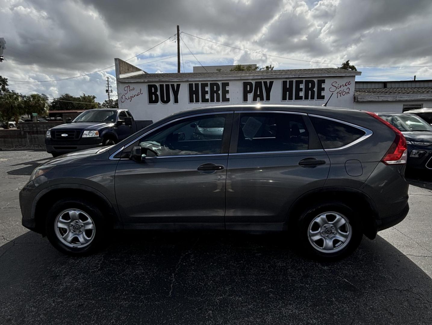 2014 Honda CR-V LX 2WD 5-Speed AT (3CZRM3H31EG) with an 2.4L L4 DOHC 16V engine, 5-Speed Automatic transmission, located at 6112 N Florida Avenue, Tampa, FL, 33604, (888) 521-5131, 27.954929, -82.459534 - Photo#0