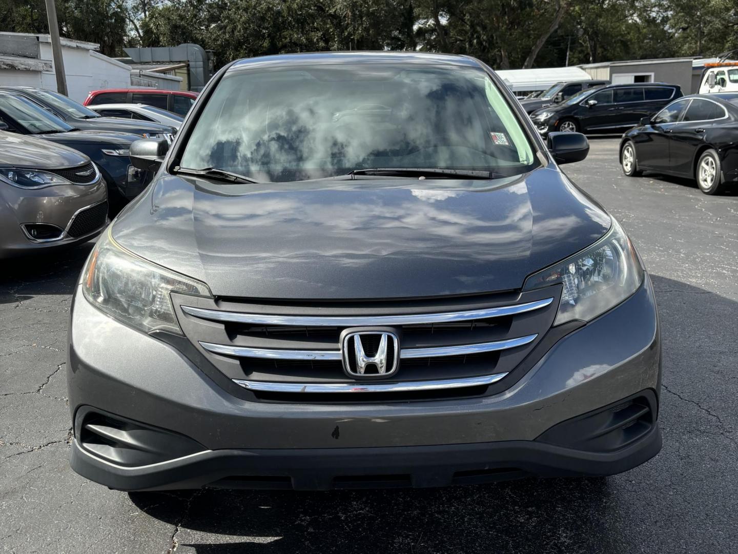 2014 Honda CR-V LX 2WD 5-Speed AT (3CZRM3H31EG) with an 2.4L L4 DOHC 16V engine, 5-Speed Automatic transmission, located at 6112 N Florida Avenue, Tampa, FL, 33604, (888) 521-5131, 27.954929, -82.459534 - Photo#1