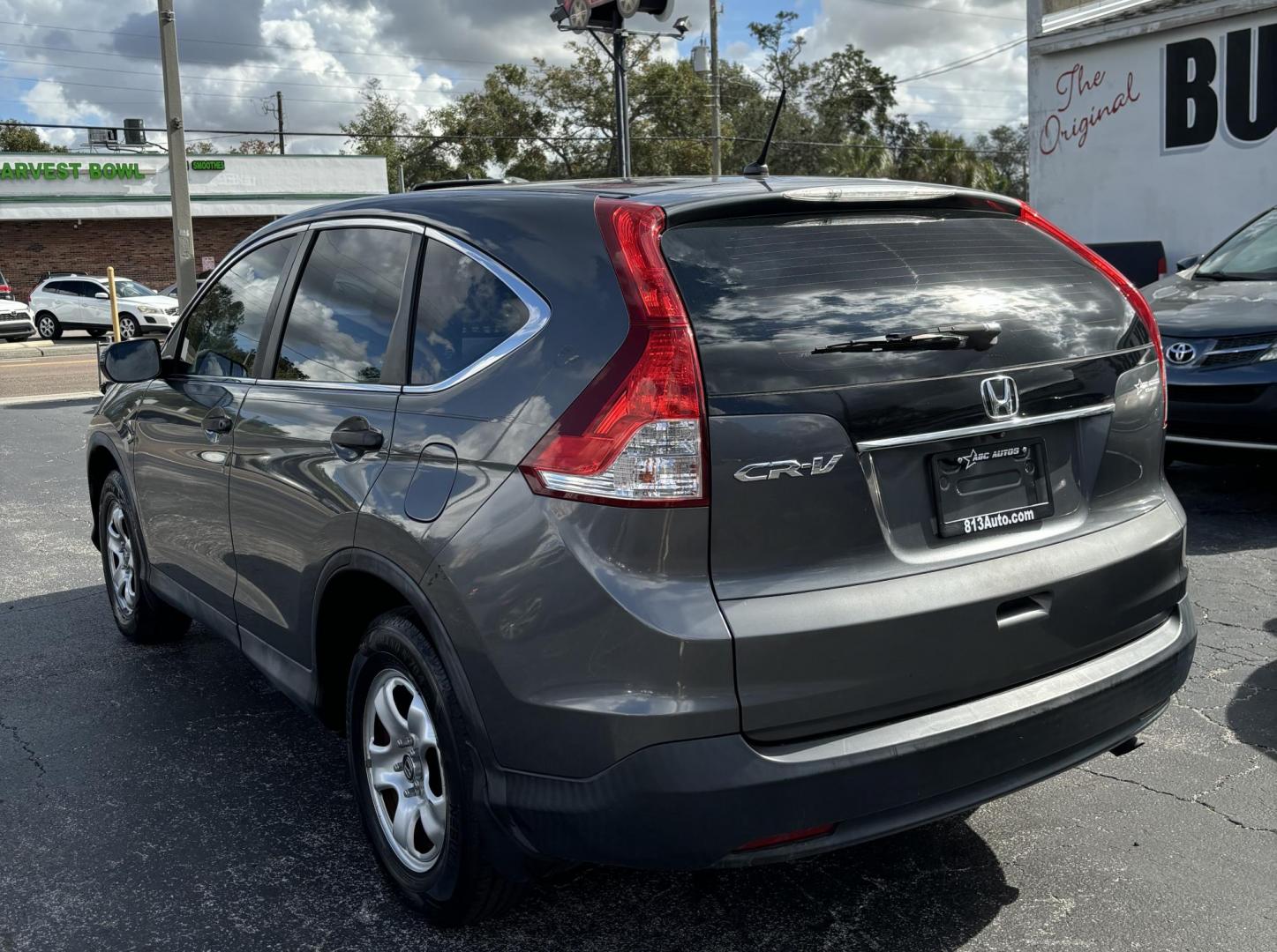 2014 Honda CR-V LX 2WD 5-Speed AT (3CZRM3H31EG) with an 2.4L L4 DOHC 16V engine, 5-Speed Automatic transmission, located at 6112 N Florida Avenue, Tampa, FL, 33604, (888) 521-5131, 27.954929, -82.459534 - Photo#3