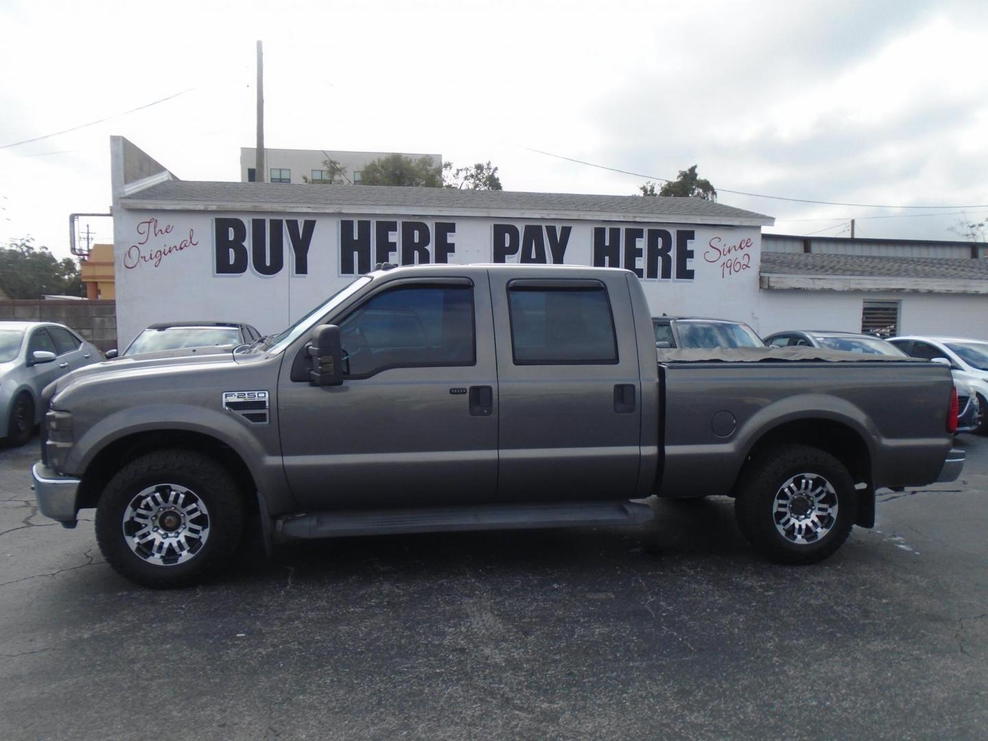 2010 Ford F-250 SD Lariat Crew Cab 2WD (1FTSW2A52AE) with an 5.4L V8 SOHC 16V engine, located at 6112 N Florida Avenue, Tampa, FL, 33604, (888) 521-5131, 27.954929, -82.459534 - Photo#0