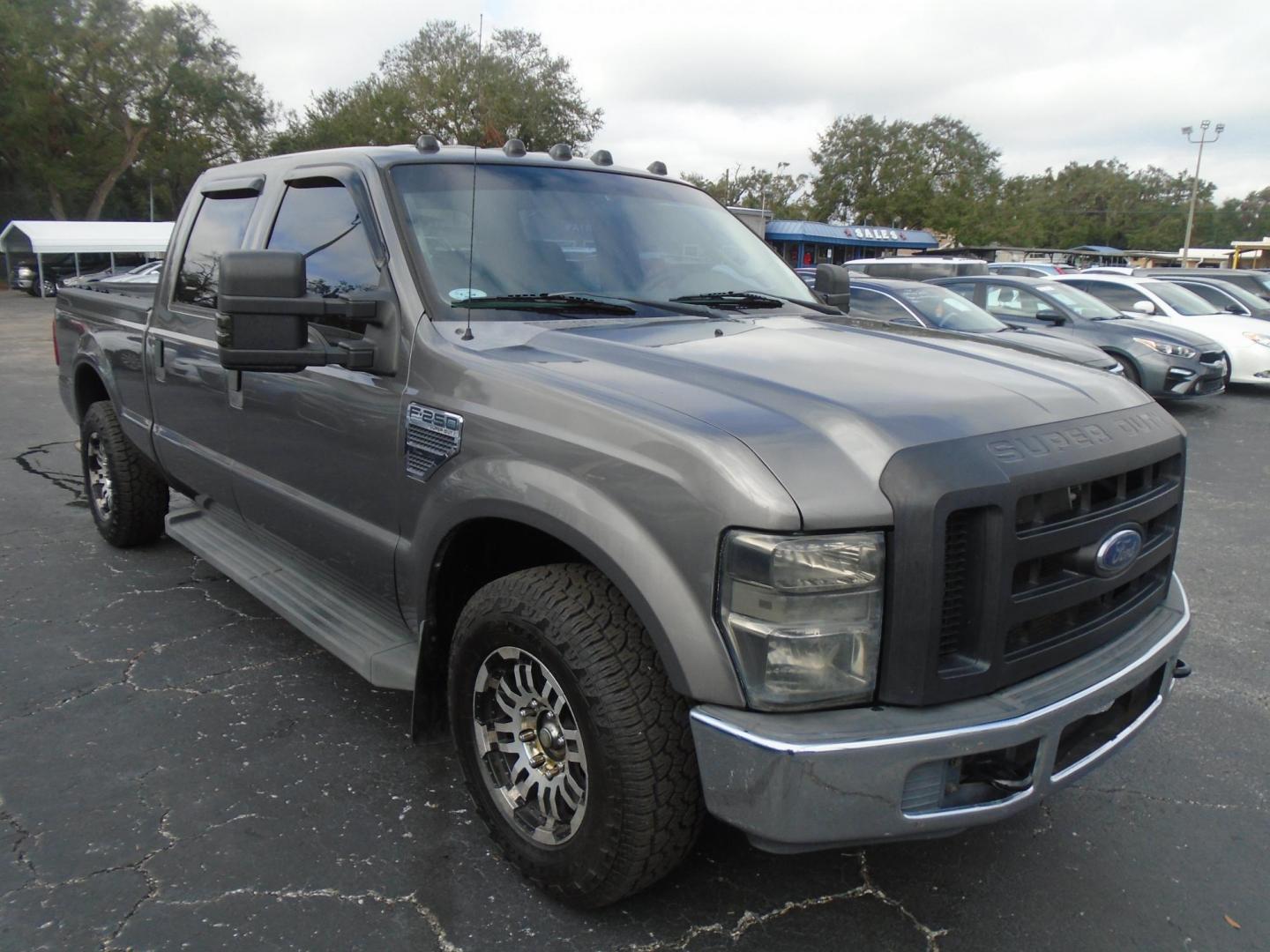 2010 Ford F-250 SD Lariat Crew Cab 2WD (1FTSW2A52AE) with an 5.4L V8 SOHC 16V engine, located at 6112 N Florida Avenue, Tampa, FL, 33604, (888) 521-5131, 27.954929, -82.459534 - Photo#2