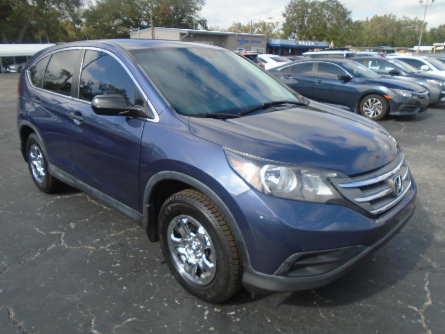 2014 Honda CR-V LX 2WD 5-Speed AT (3CZRM3H30EG) with an 2.4L L4 DOHC 16V engine, 5-Speed Automatic transmission, located at 6112 N Florida Avenue, Tampa, FL, 33604, (888) 521-5131, 27.954929, -82.459534 - Photo#2