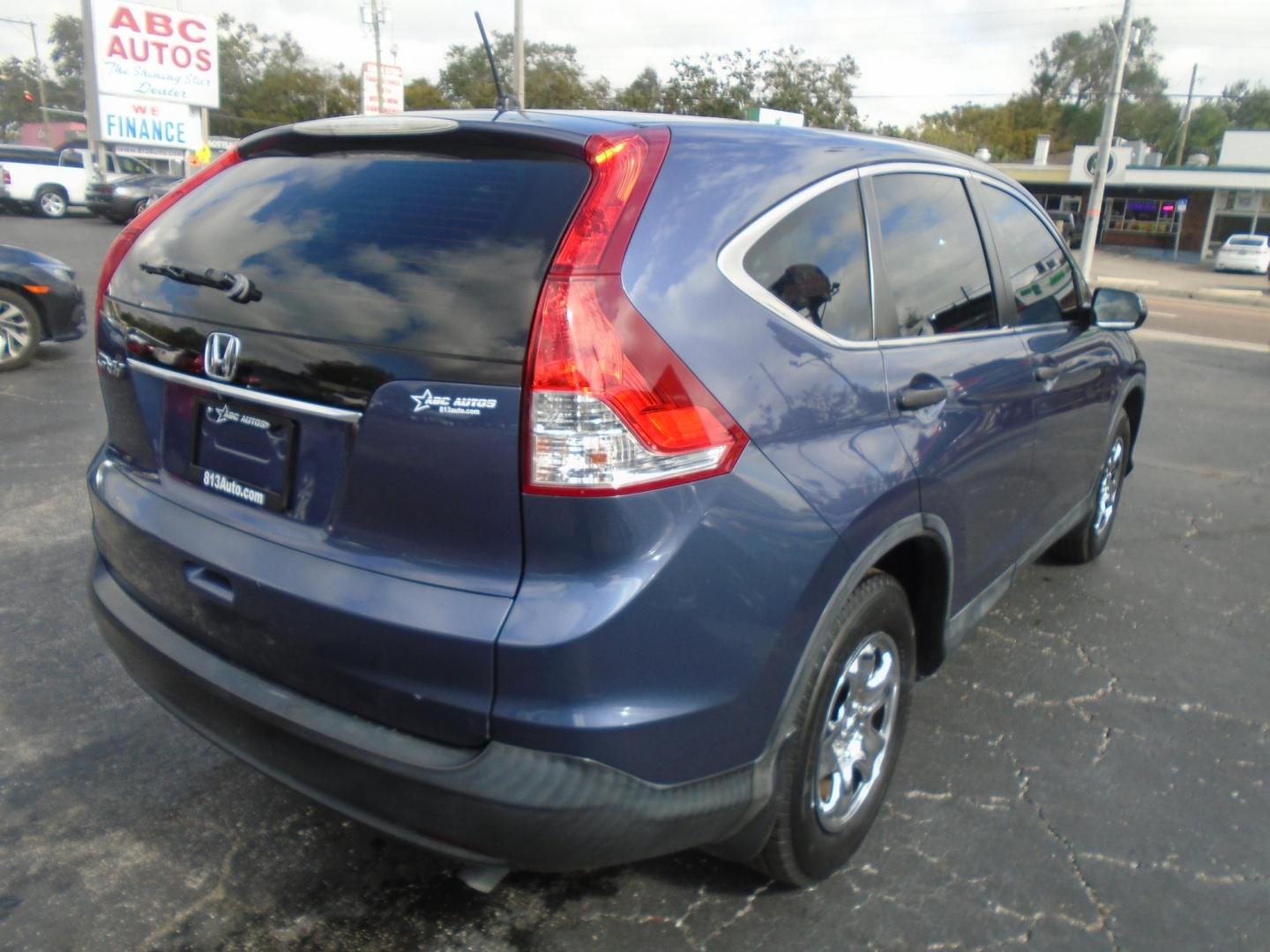 2014 Honda CR-V LX 2WD 5-Speed AT (3CZRM3H30EG) with an 2.4L L4 DOHC 16V engine, 5-Speed Automatic transmission, located at 6112 N Florida Avenue, Tampa, FL, 33604, (888) 521-5131, 27.954929, -82.459534 - Photo#3