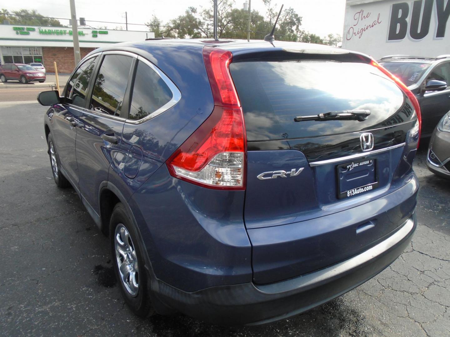 2014 Honda CR-V LX 2WD 5-Speed AT (3CZRM3H30EG) with an 2.4L L4 DOHC 16V engine, 5-Speed Automatic transmission, located at 6112 N Florida Avenue, Tampa, FL, 33604, (888) 521-5131, 27.954929, -82.459534 - Photo#5