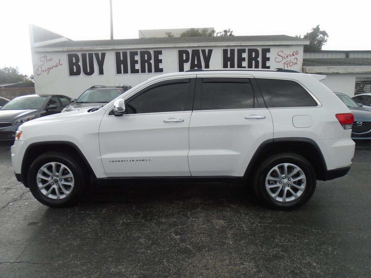 2014 Jeep Grand Cherokee Limited 4WD (1C4RJFBG5EC) with an 3.6L V6 DOHC 24V engine, 5-Speed Automatic transmission, located at 6112 N Florida Avenue, Tampa, FL, 33604, (888) 521-5131, 27.954929, -82.459534 - Photo#0