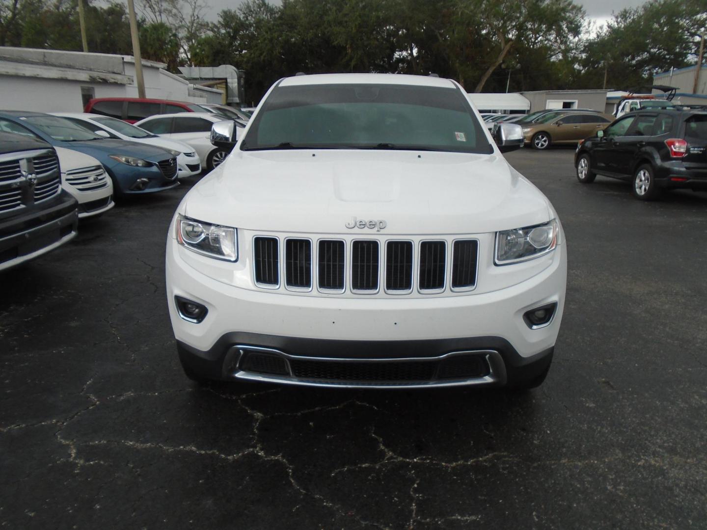 2014 Jeep Grand Cherokee Limited 4WD (1C4RJFBG5EC) with an 3.6L V6 DOHC 24V engine, 5-Speed Automatic transmission, located at 6112 N Florida Avenue, Tampa, FL, 33604, (888) 521-5131, 27.954929, -82.459534 - Photo#1