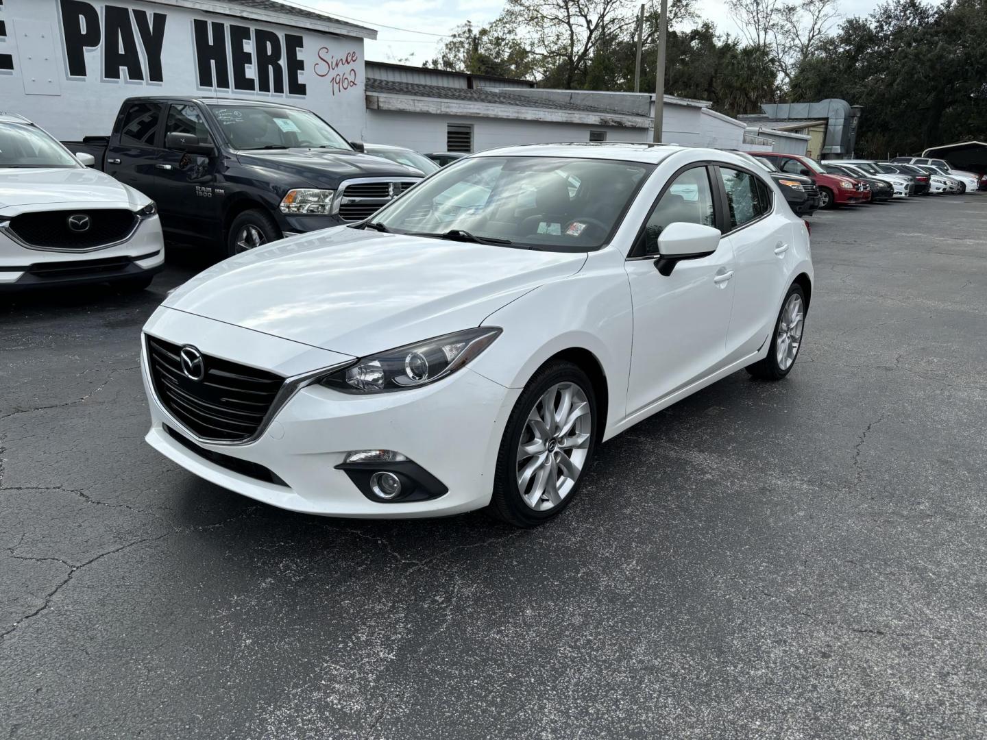 2015 Mazda MAZDA3 s Touring AT 5-Door (JM1BM1L34F1) with an 2.5L L4 DOHC 16V engine, 6-Speed Automatic transmission, located at 6112 N Florida Avenue, Tampa, FL, 33604, (888) 521-5131, 27.954929, -82.459534 - Photo#1