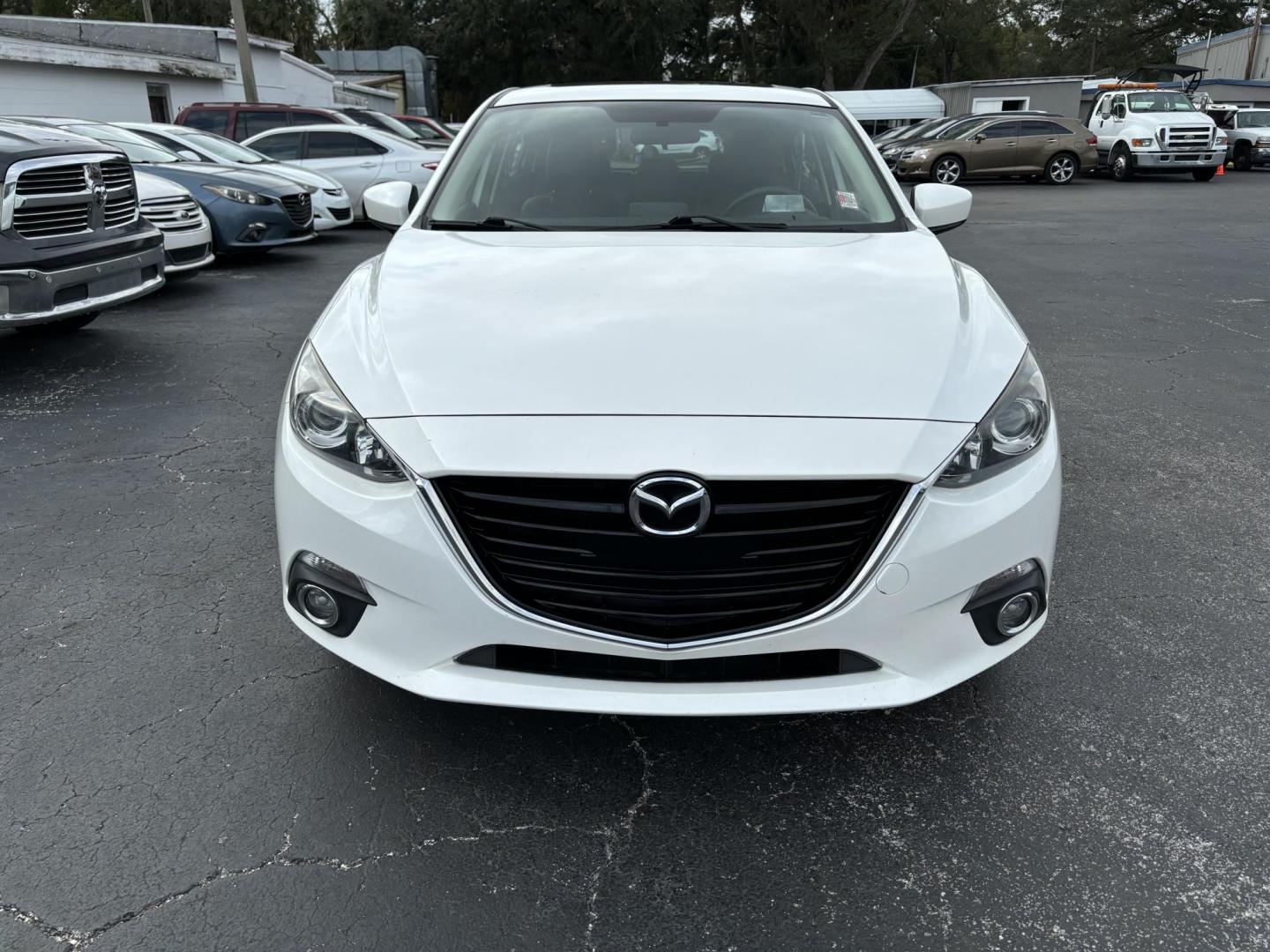 2015 Mazda MAZDA3 s Touring AT 5-Door (JM1BM1L34F1) with an 2.5L L4 DOHC 16V engine, 6-Speed Automatic transmission, located at 6112 N Florida Avenue, Tampa, FL, 33604, (888) 521-5131, 27.954929, -82.459534 - Photo#2