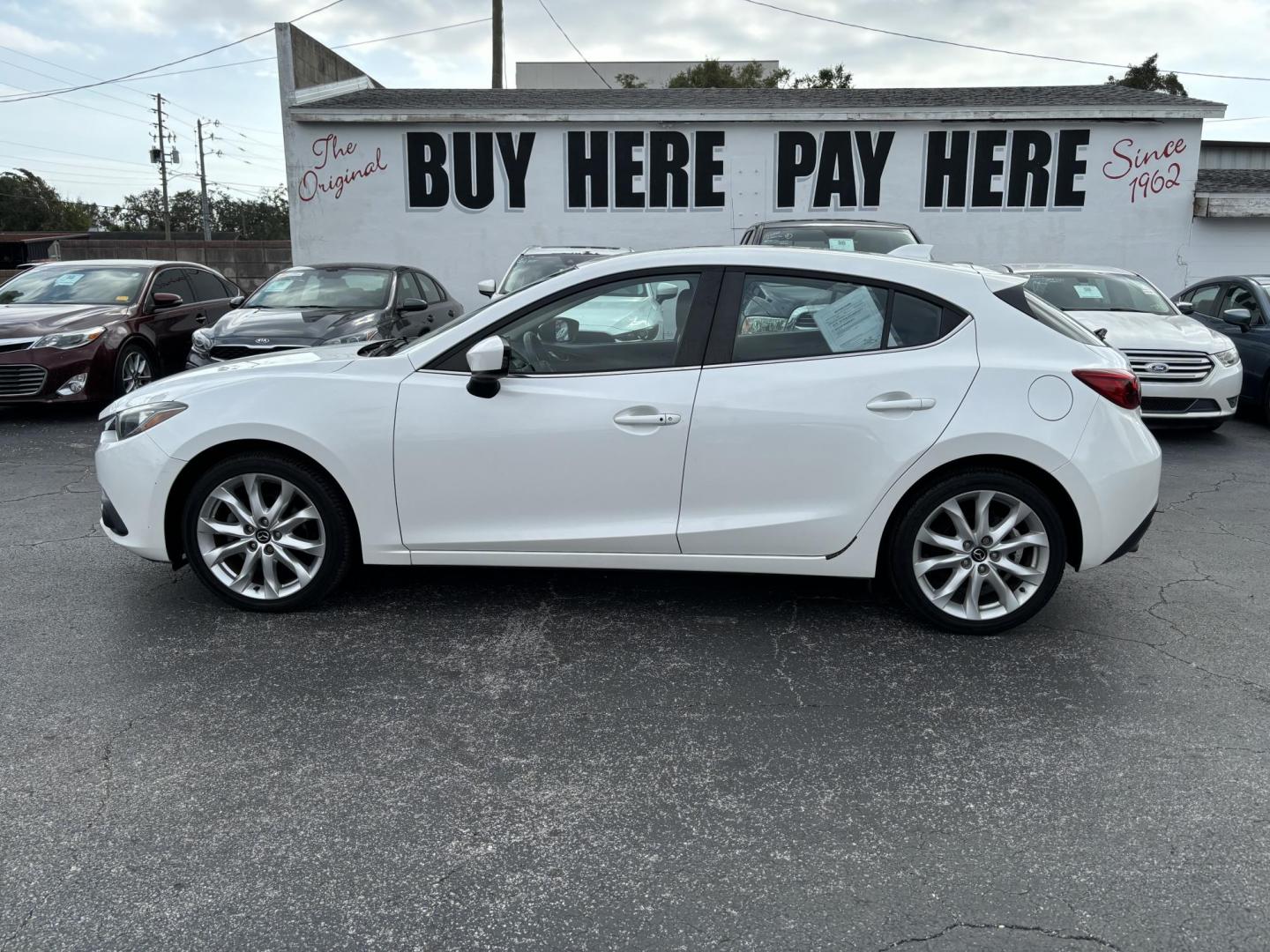 2015 Mazda MAZDA3 s Touring AT 5-Door (JM1BM1L34F1) with an 2.5L L4 DOHC 16V engine, 6-Speed Automatic transmission, located at 6112 N Florida Avenue, Tampa, FL, 33604, (888) 521-5131, 27.954929, -82.459534 - Photo#0