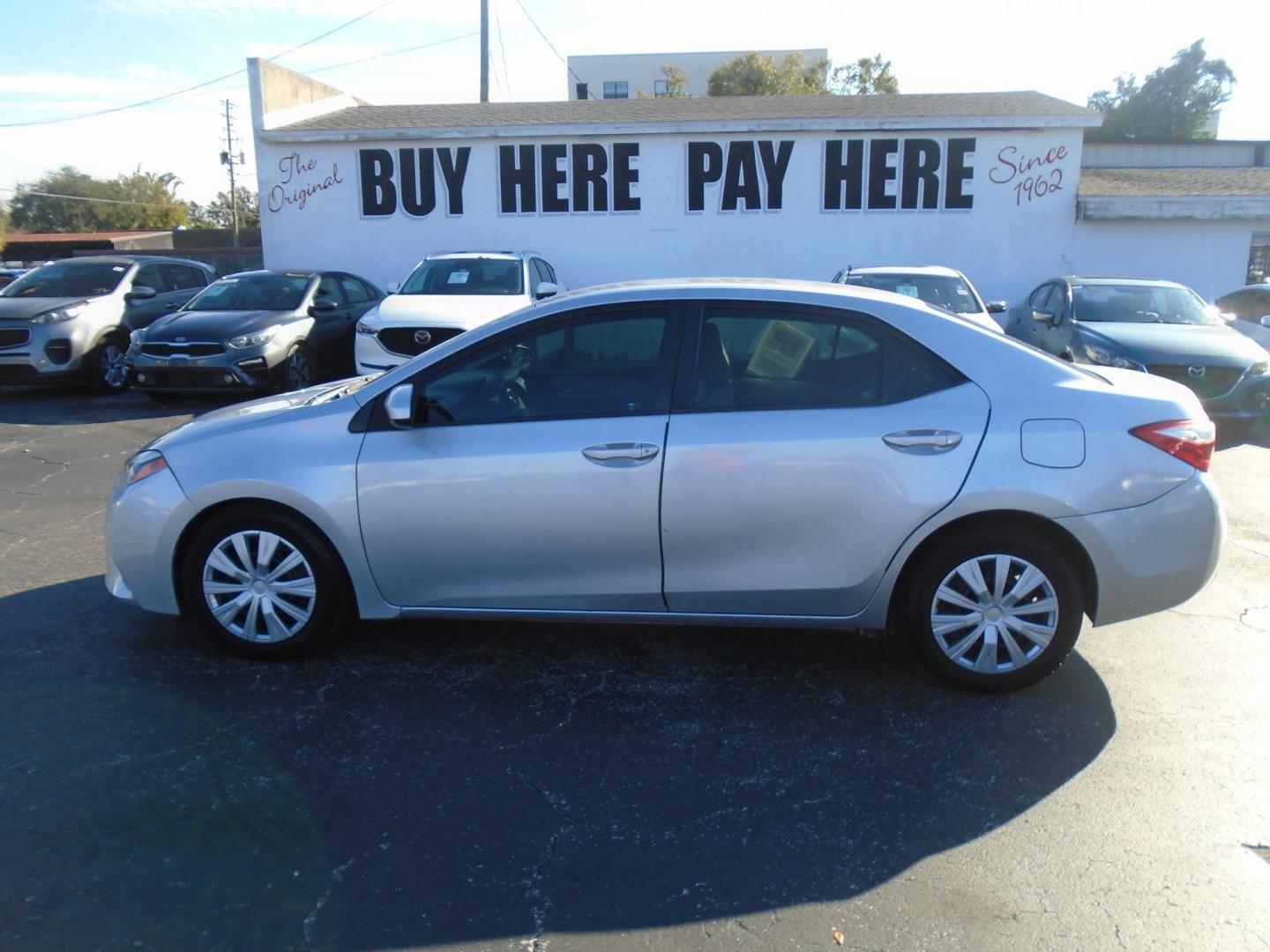 2015 Toyota Corolla L 4-Speed AT (5YFBURHE9FP) with an 1.8L L4 DOHC 16V engine, 4-Speed Automatic transmission, located at 6112 N Florida Avenue, Tampa, FL, 33604, (888) 521-5131, 27.954929, -82.459534 - Photo#0