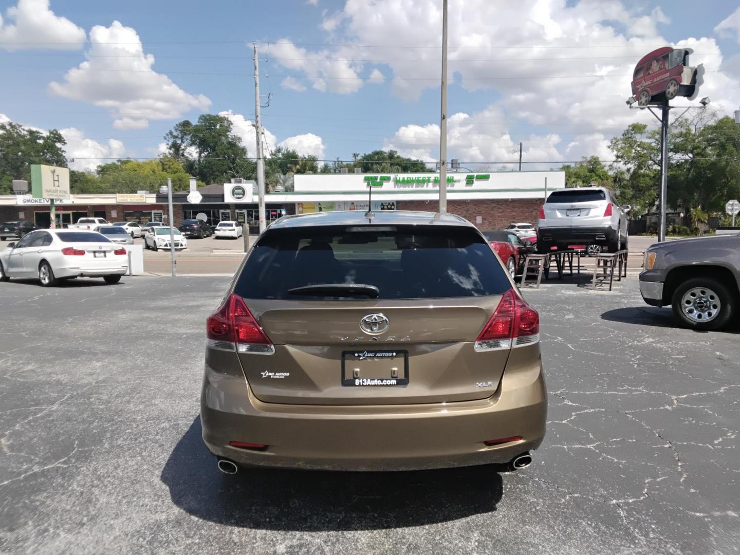 2013 GOLD /Beige Toyota Venza LE V6 FWD (4T3ZK3BB2DU) with an 3.5L V6 DOHC 24V engine, 6-Speed Automatic transmission, located at 6112 N Florida Avenue, Tampa, FL, 33604, (888) 521-5131, 27.954929, -82.459534 - $499 DOWN PLUS TAX & TAG. - Photo#3