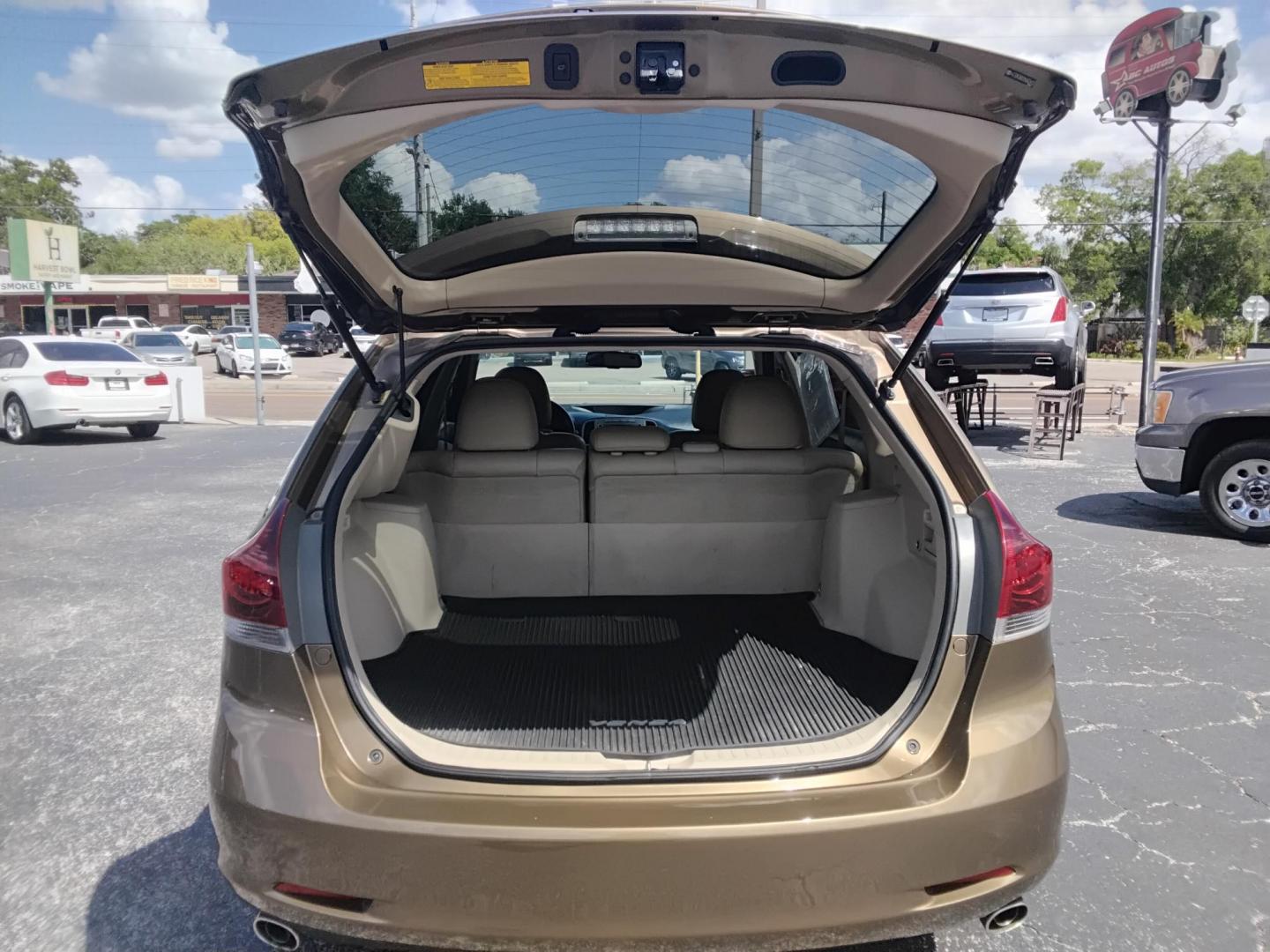 2013 GOLD /Beige Toyota Venza LE V6 FWD (4T3ZK3BB2DU) with an 3.5L V6 DOHC 24V engine, 6-Speed Automatic transmission, located at 6112 N Florida Avenue, Tampa, FL, 33604, (888) 521-5131, 27.954929, -82.459534 - $499 DOWN PLUS TAX & TAG. - Photo#4
