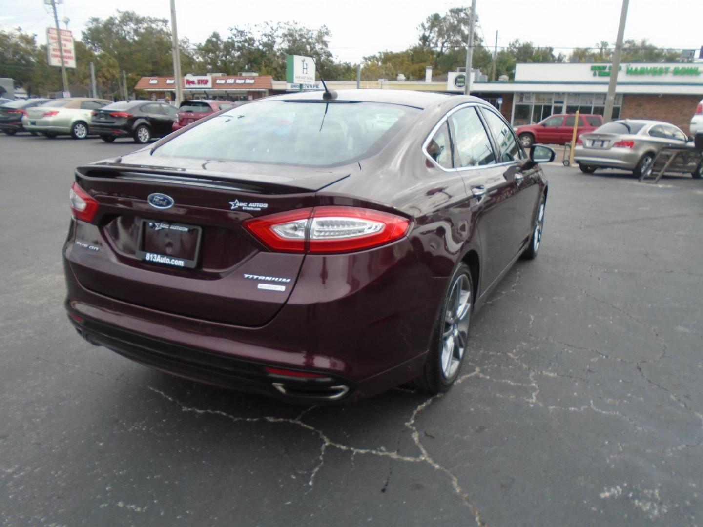 2013 Ford Fusion Titanium (3FA6P0K91DR) with an 2.0L L4 DOHC 16V engine, located at 6112 N Florida Avenue, Tampa, FL, 33604, (888) 521-5131, 27.954929, -82.459534 - Photo#5