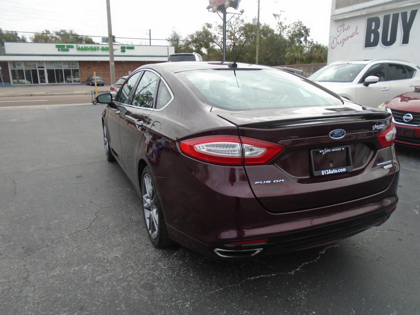 2013 Ford Fusion Titanium (3FA6P0K91DR) with an 2.0L L4 DOHC 16V engine, located at 6112 N Florida Avenue, Tampa, FL, 33604, (888) 521-5131, 27.954929, -82.459534 - Photo#6