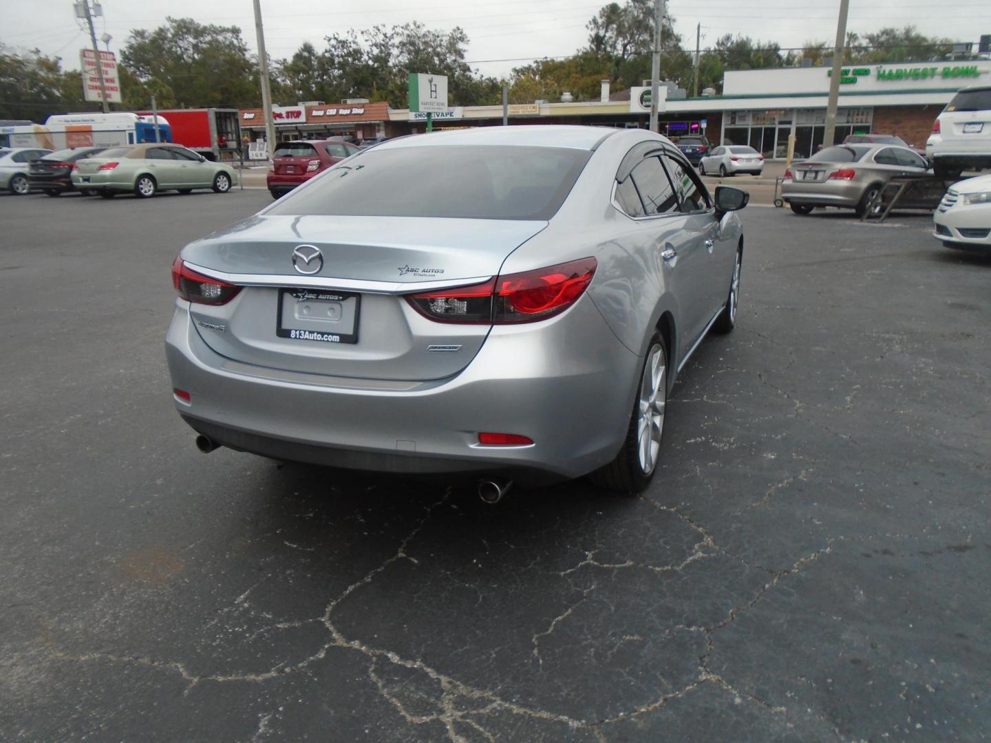 2016 Mazda Mazda6 i Touring (JM1GJ1V53G1) with an 2.5L L4 DOHC 16V engine, 6-Speed Automatic transmission, located at 6112 N Florida Avenue, Tampa, FL, 33604, (888) 521-5131, 27.954929, -82.459534 - Photo#4