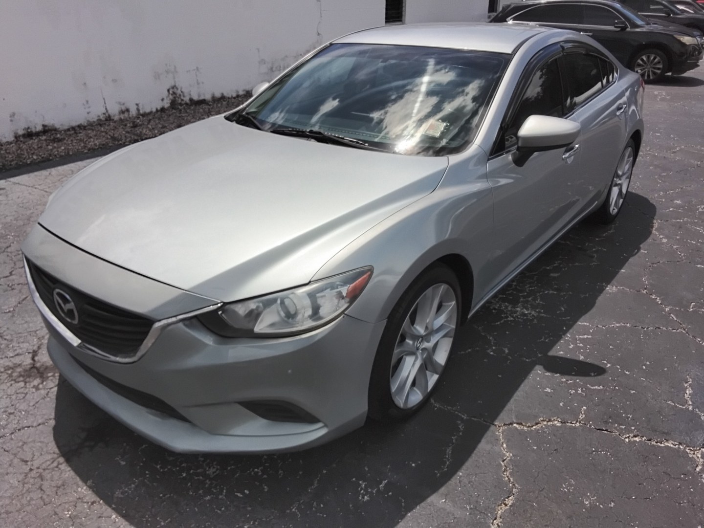 2016 SILVER /BLACK Mazda Mazda6 i Touring (JM1GJ1V53G1) with an 2.5L L4 DOHC 16V engine, 6-Speed Automatic transmission, located at 6112 N Florida Avenue, Tampa, FL, 33604, (888) 521-5131, 27.954929, -82.459534 - $499 DOWN PLUS TAX & TAG.- Photo#2