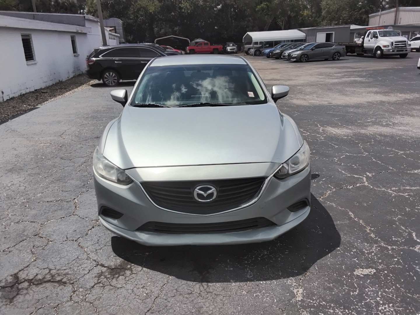 2016 SILVER /BLACK Mazda Mazda6 i Touring (JM1GJ1V53G1) with an 2.5L L4 DOHC 16V engine, 6-Speed Automatic transmission, located at 6112 N Florida Avenue, Tampa, FL, 33604, (888) 521-5131, 27.954929, -82.459534 - $499 DOWN PLUS TAX & TAG.- Photo#1