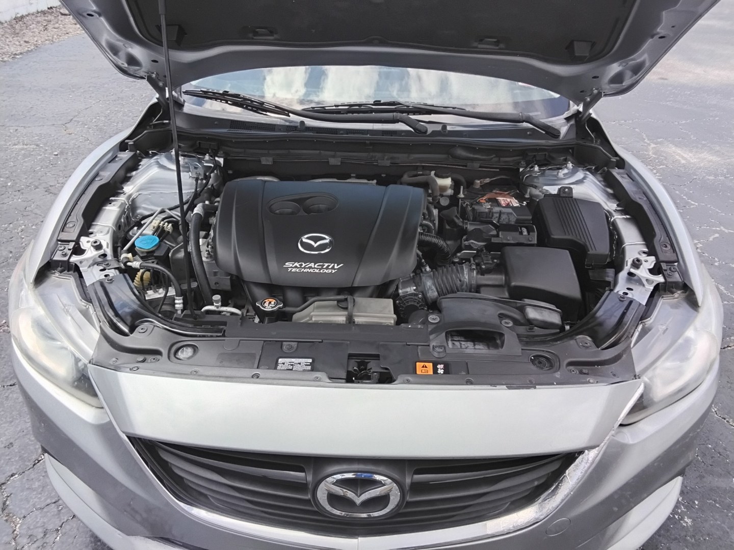 2016 SILVER /BLACK Mazda Mazda6 i Touring (JM1GJ1V53G1) with an 2.5L L4 DOHC 16V engine, 6-Speed Automatic transmission, located at 6112 N Florida Avenue, Tampa, FL, 33604, (888) 521-5131, 27.954929, -82.459534 - $499 DOWN PLUS TAX & TAG.- Photo#12