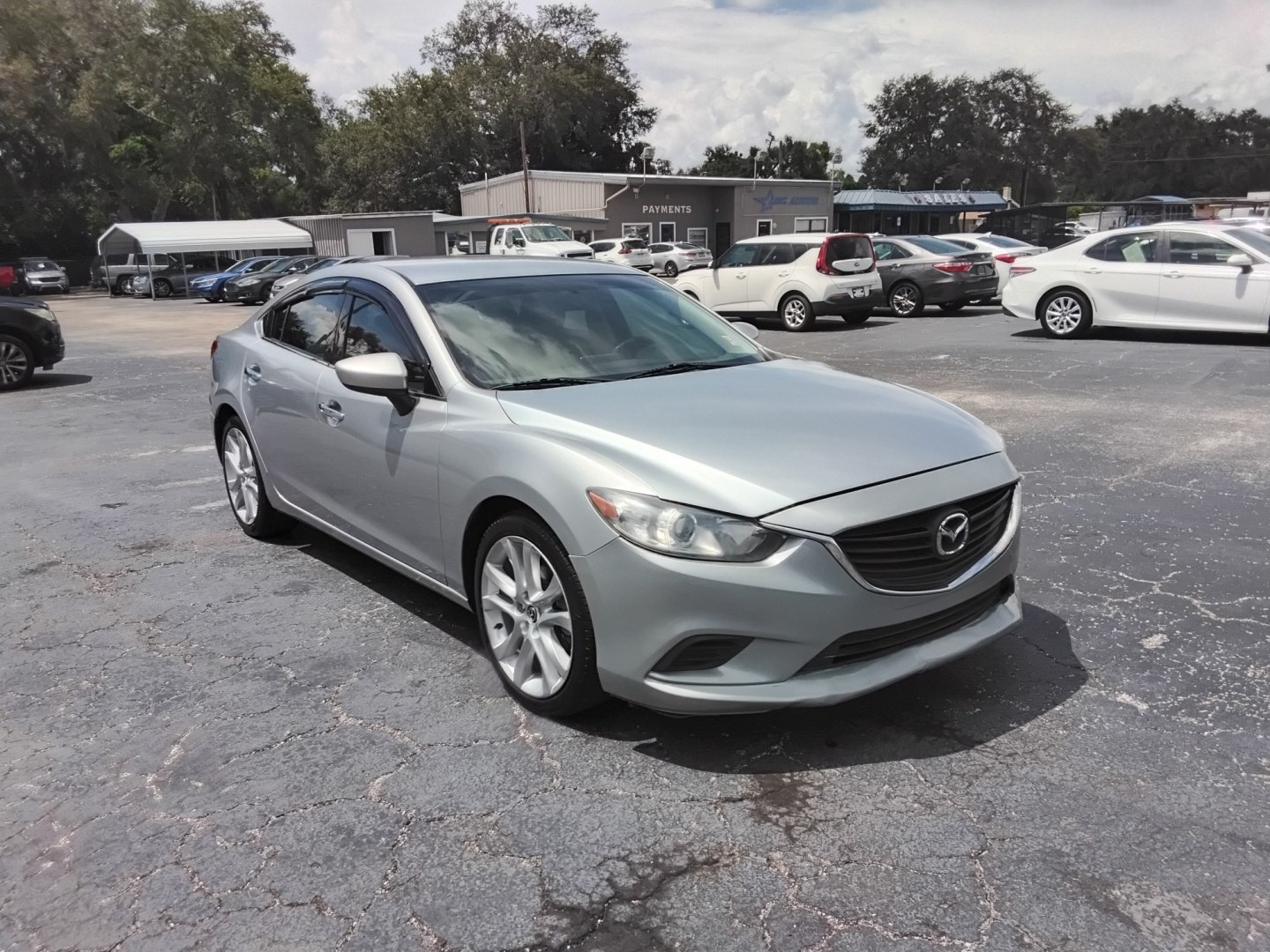 2016 SILVER /BLACK Mazda Mazda6 i Touring (JM1GJ1V53G1) with an 2.5L L4 DOHC 16V engine, 6-Speed Automatic transmission, located at 6112 N Florida Avenue, Tampa, FL, 33604, (888) 521-5131, 27.954929, -82.459534 - $499 DOWN PLUS TAX & TAG.- Photo#3
