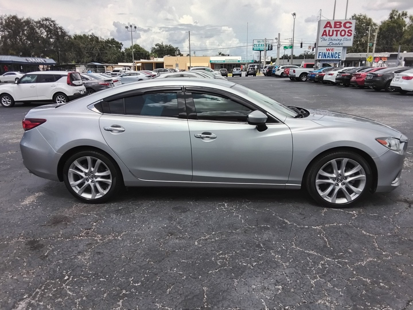 2016 SILVER /BLACK Mazda Mazda6 i Touring (JM1GJ1V53G1) with an 2.5L L4 DOHC 16V engine, 6-Speed Automatic transmission, located at 6112 N Florida Avenue, Tampa, FL, 33604, (888) 521-5131, 27.954929, -82.459534 - $499 DOWN PLUS TAX & TAG.- Photo#4
