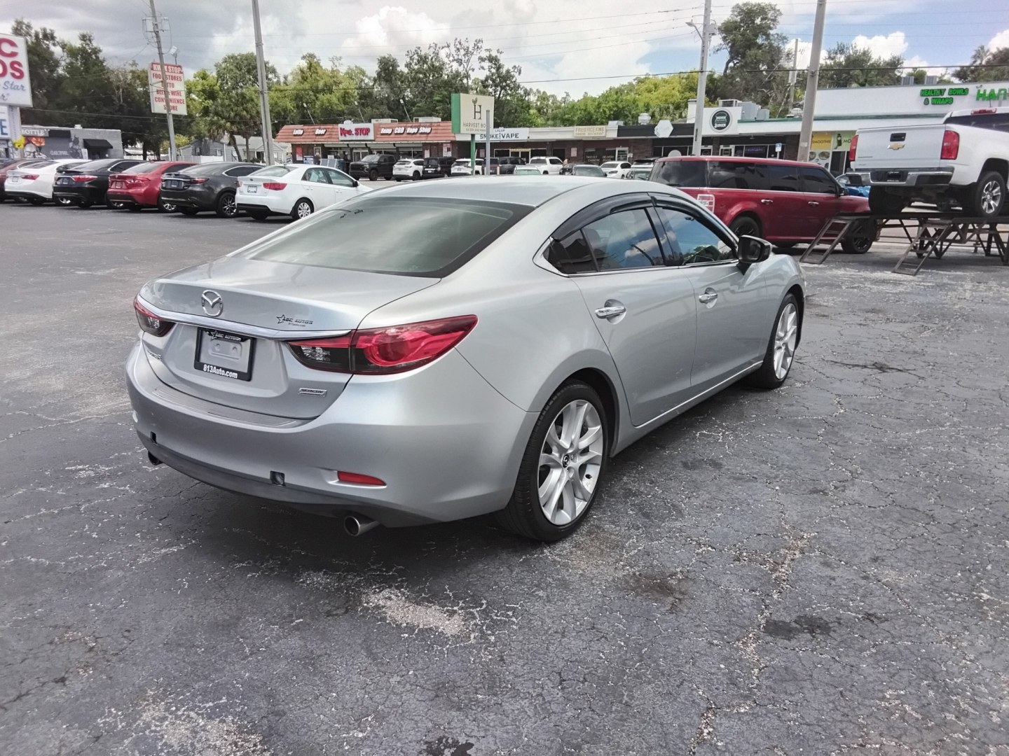2016 SILVER /BLACK Mazda Mazda6 i Touring (JM1GJ1V53G1) with an 2.5L L4 DOHC 16V engine, 6-Speed Automatic transmission, located at 6112 N Florida Avenue, Tampa, FL, 33604, (888) 521-5131, 27.954929, -82.459534 - $499 DOWN PLUS TAX & TAG.- Photo#5