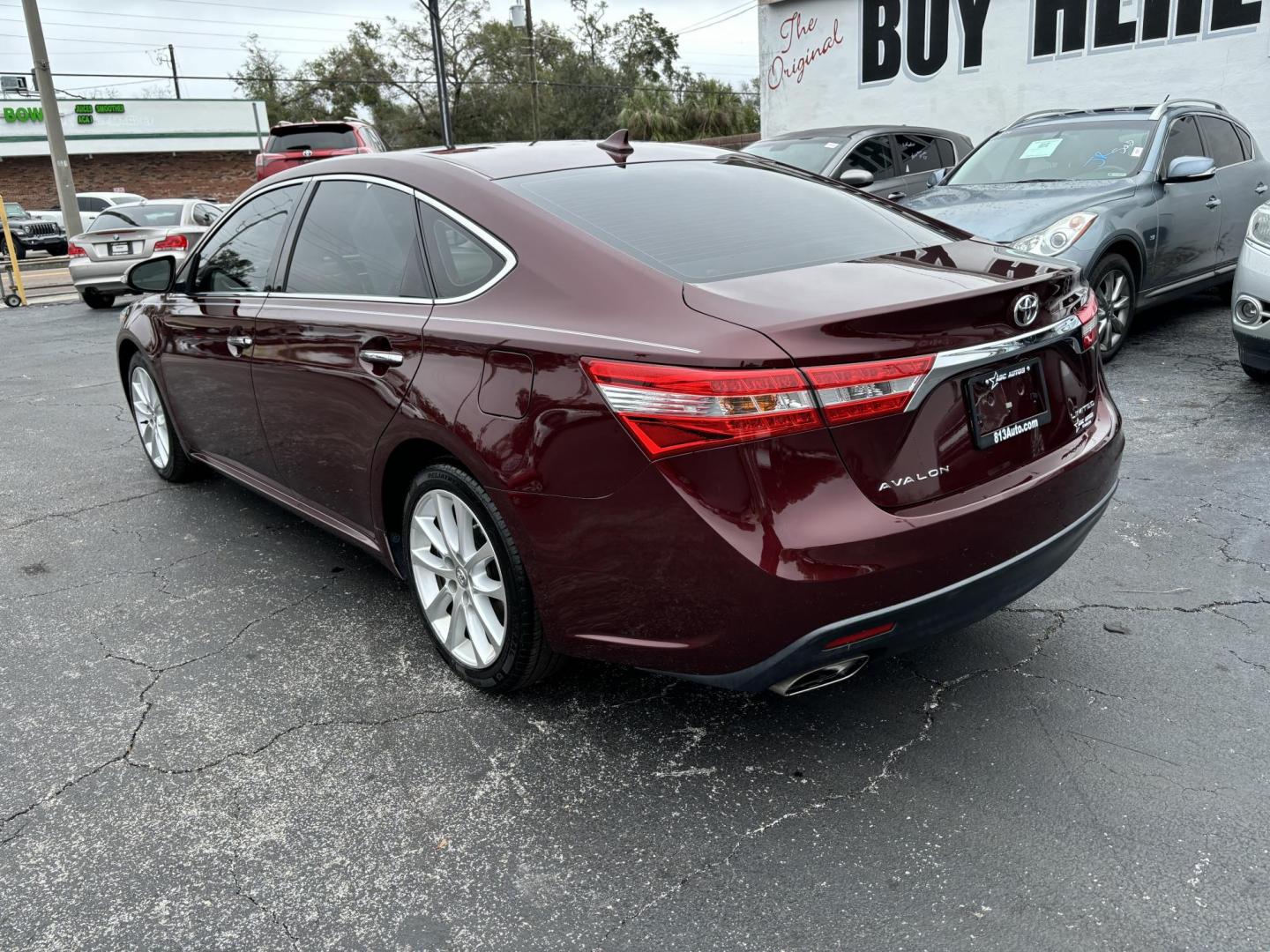 2014 Toyota Avalon XLE (4T1BK1EB6EU) with an 3.5L V6 DOHC 24V engine, 6-Speed Automatic transmission, located at 6112 N Florida Avenue, Tampa, FL, 33604, (888) 521-5131, 27.954929, -82.459534 - Photo#4