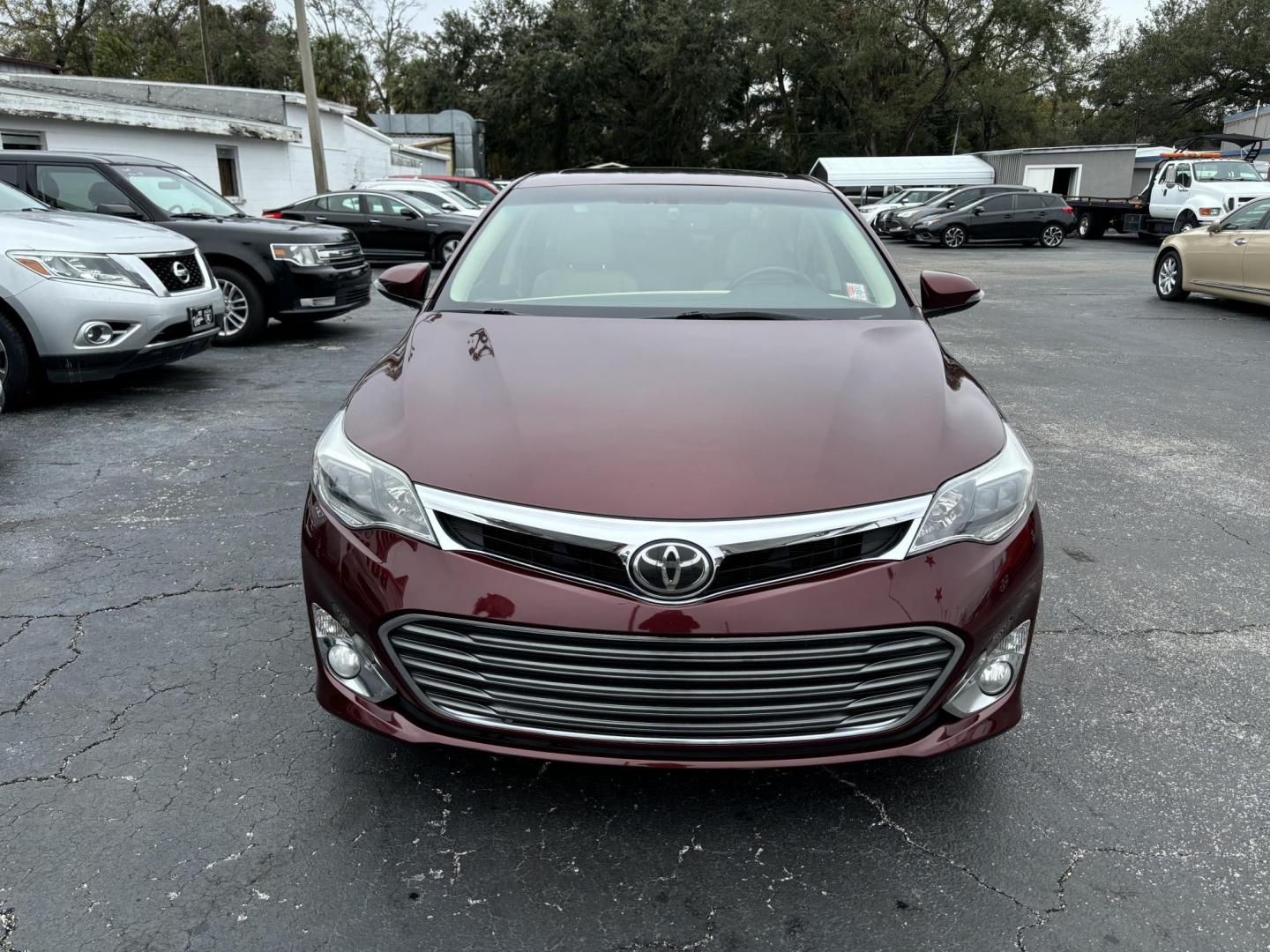 2014 Toyota Avalon XLE (4T1BK1EB6EU) with an 3.5L V6 DOHC 24V engine, 6-Speed Automatic transmission, located at 6112 N Florida Avenue, Tampa, FL, 33604, (888) 521-5131, 27.954929, -82.459534 - Photo#1