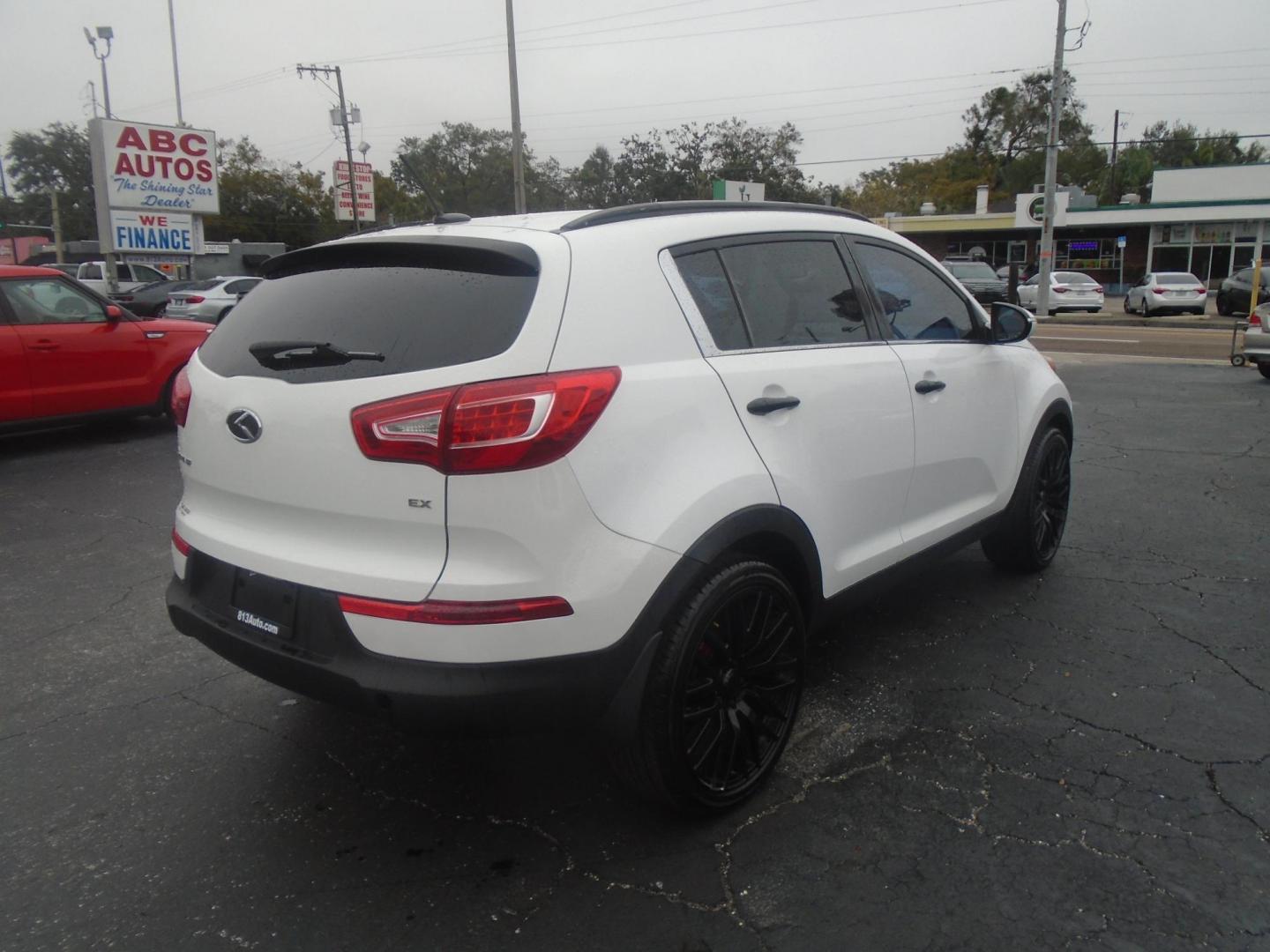 2012 Kia Sportage EX FWD (KNDPC3A26C7) with an 2.4L V6 DOHC 24V engine, 6-Speed Automatic transmission, located at 6112 N Florida Avenue, Tampa, FL, 33604, (888) 521-5131, 27.954929, -82.459534 - Photo#5