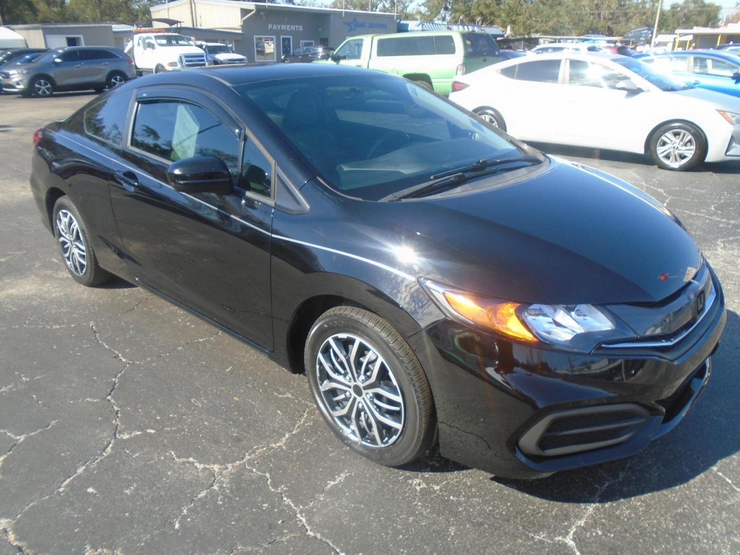 2015 Honda Civic LX Coupe CVT (2HGFG3B56FH) with an 2.3L L4 SOHC 16V engine, Continuously Variable Transmission transmission, located at 6112 N Florida Avenue, Tampa, FL, 33604, (888) 521-5131, 27.954929, -82.459534 - Photo#6