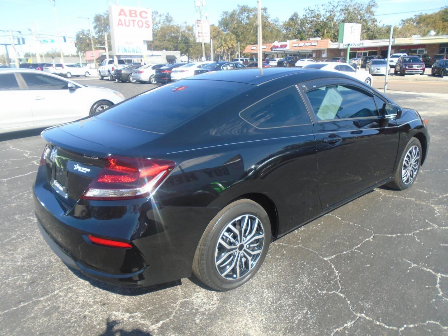 2015 Honda Civic LX Coupe CVT (2HGFG3B56FH) with an 2.3L L4 SOHC 16V engine, Continuously Variable Transmission transmission, located at 6112 N Florida Avenue, Tampa, FL, 33604, (888) 521-5131, 27.954929, -82.459534 - Photo#7