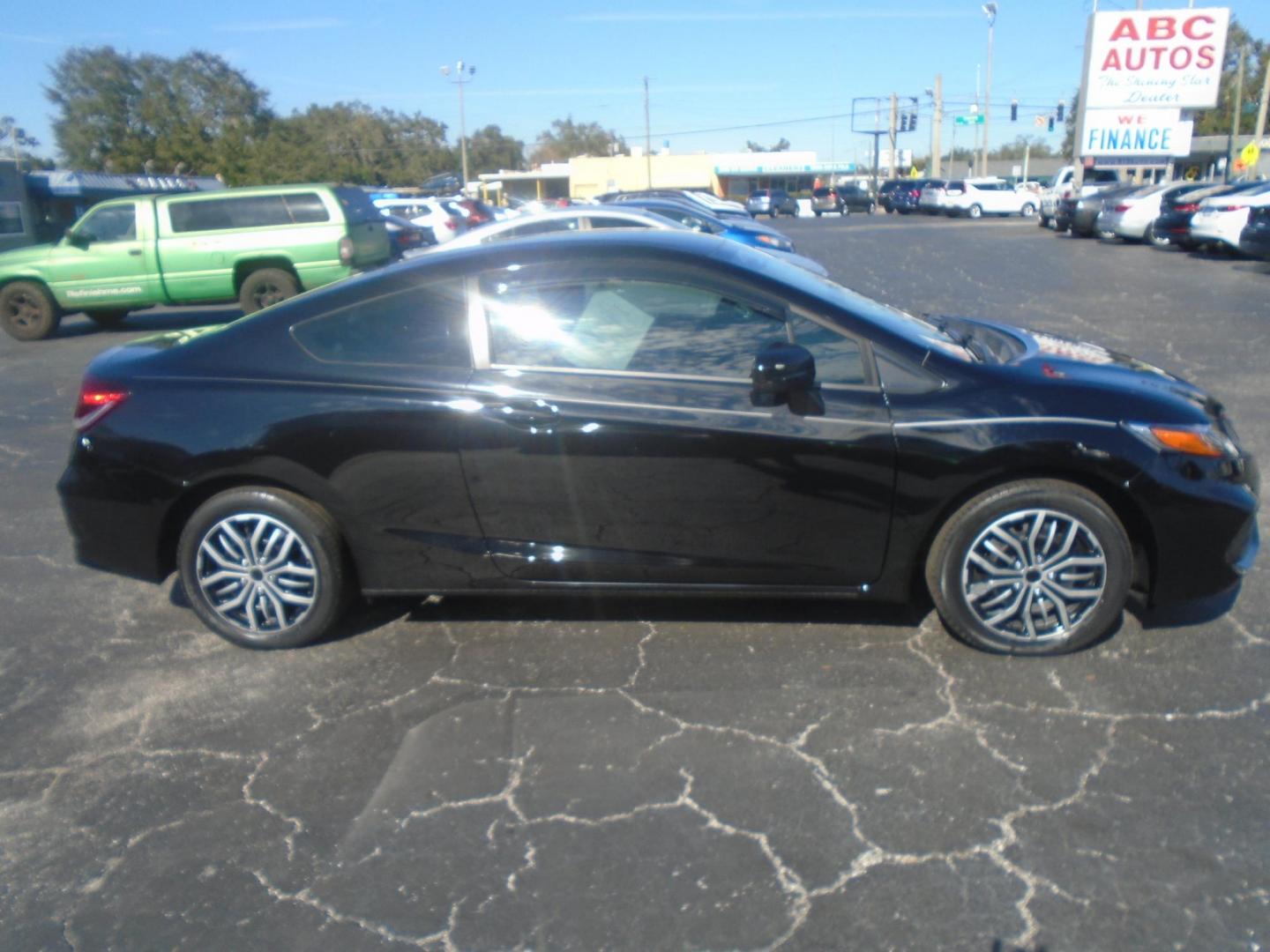 2015 Honda Civic LX Coupe CVT (2HGFG3B56FH) with an 2.3L L4 SOHC 16V engine, Continuously Variable Transmission transmission, located at 6112 N Florida Avenue, Tampa, FL, 33604, (888) 521-5131, 27.954929, -82.459534 - Photo#8