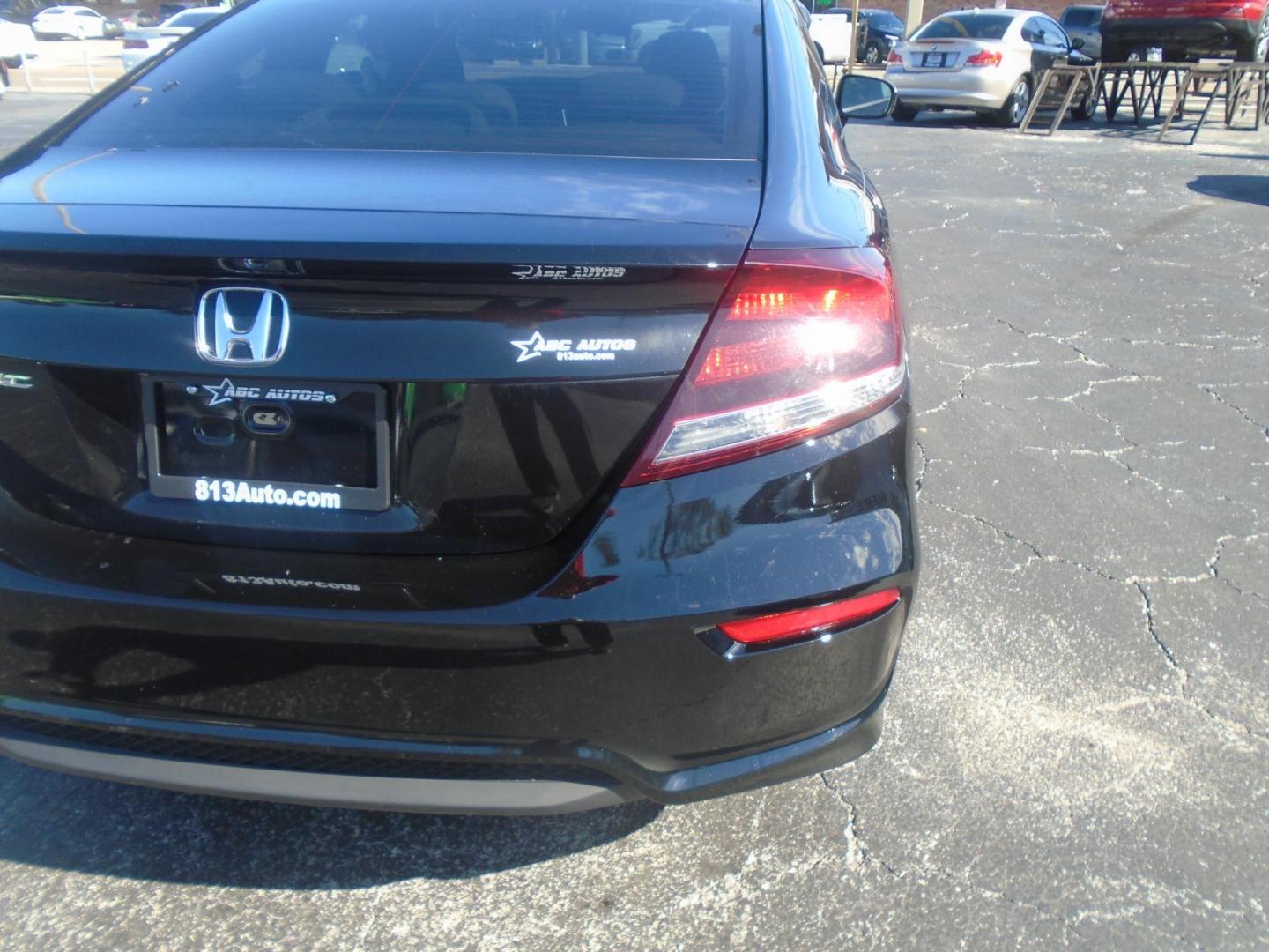 2015 Honda Civic LX Coupe CVT (2HGFG3B56FH) with an 2.3L L4 SOHC 16V engine, Continuously Variable Transmission transmission, located at 6112 N Florida Avenue, Tampa, FL, 33604, (888) 521-5131, 27.954929, -82.459534 - Photo#9