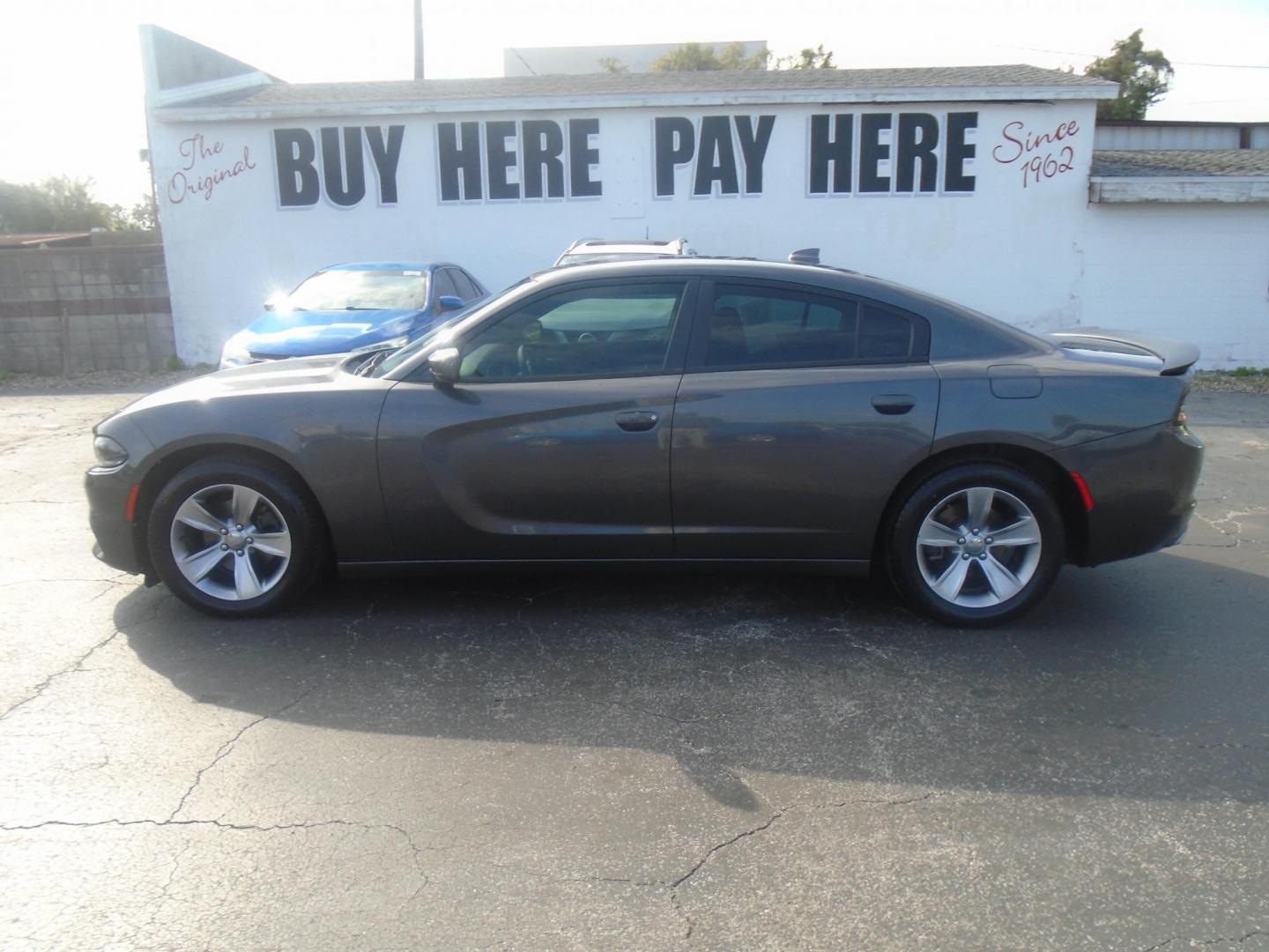 2018 Dodge Charger SXT (2C3CDXHG5JH) with an 3.6L V6 DOHC 24V engine, 8A transmission, located at 6112 N Florida Avenue, Tampa, FL, 33604, (888) 521-5131, 27.954929, -82.459534 - Photo#0